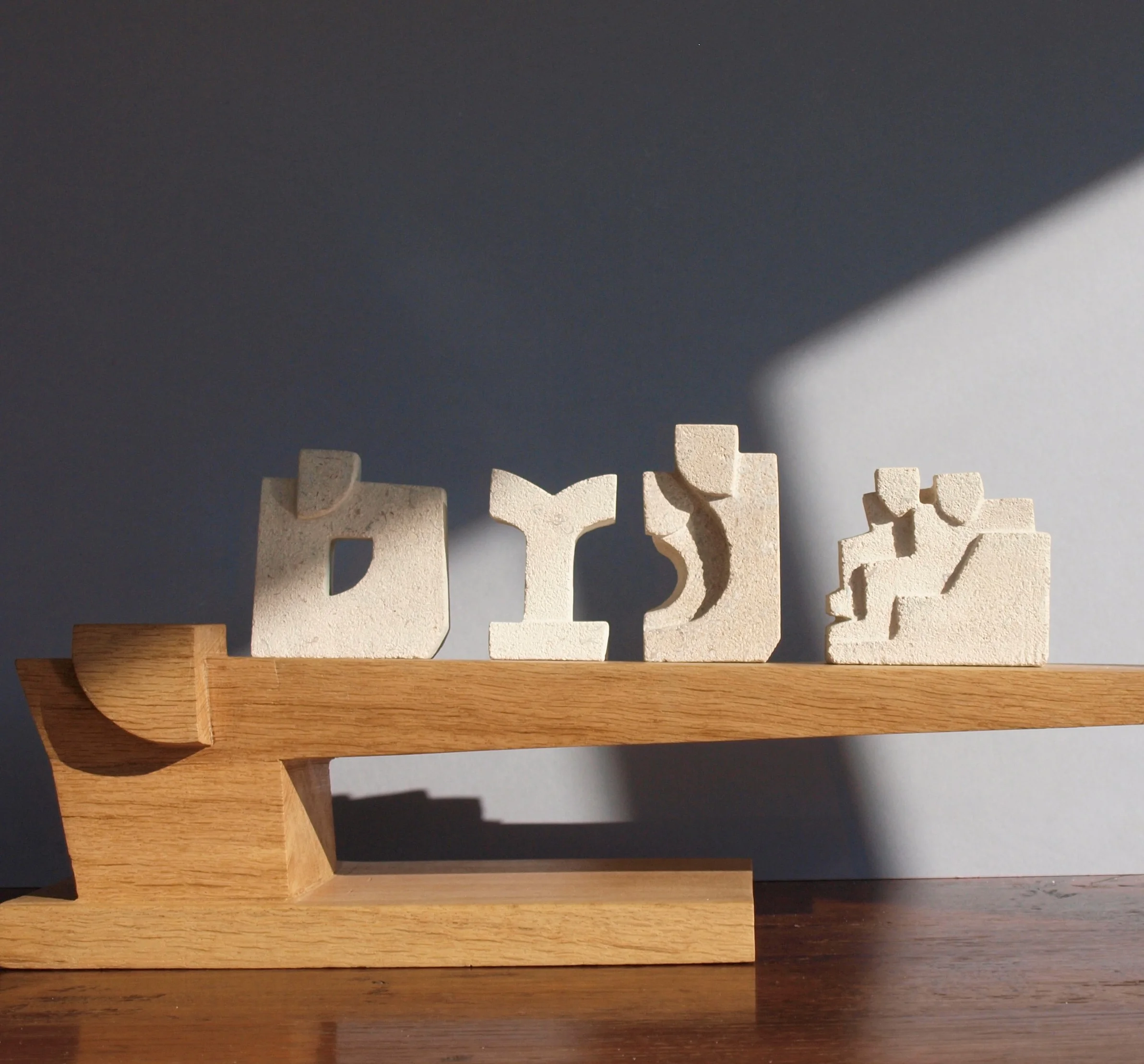 'Reach' and small Bath Stone Sculptures 