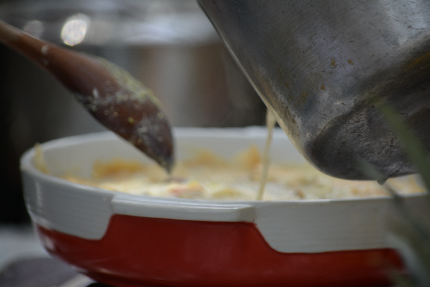 Pour in warm milk and spice mixture.
