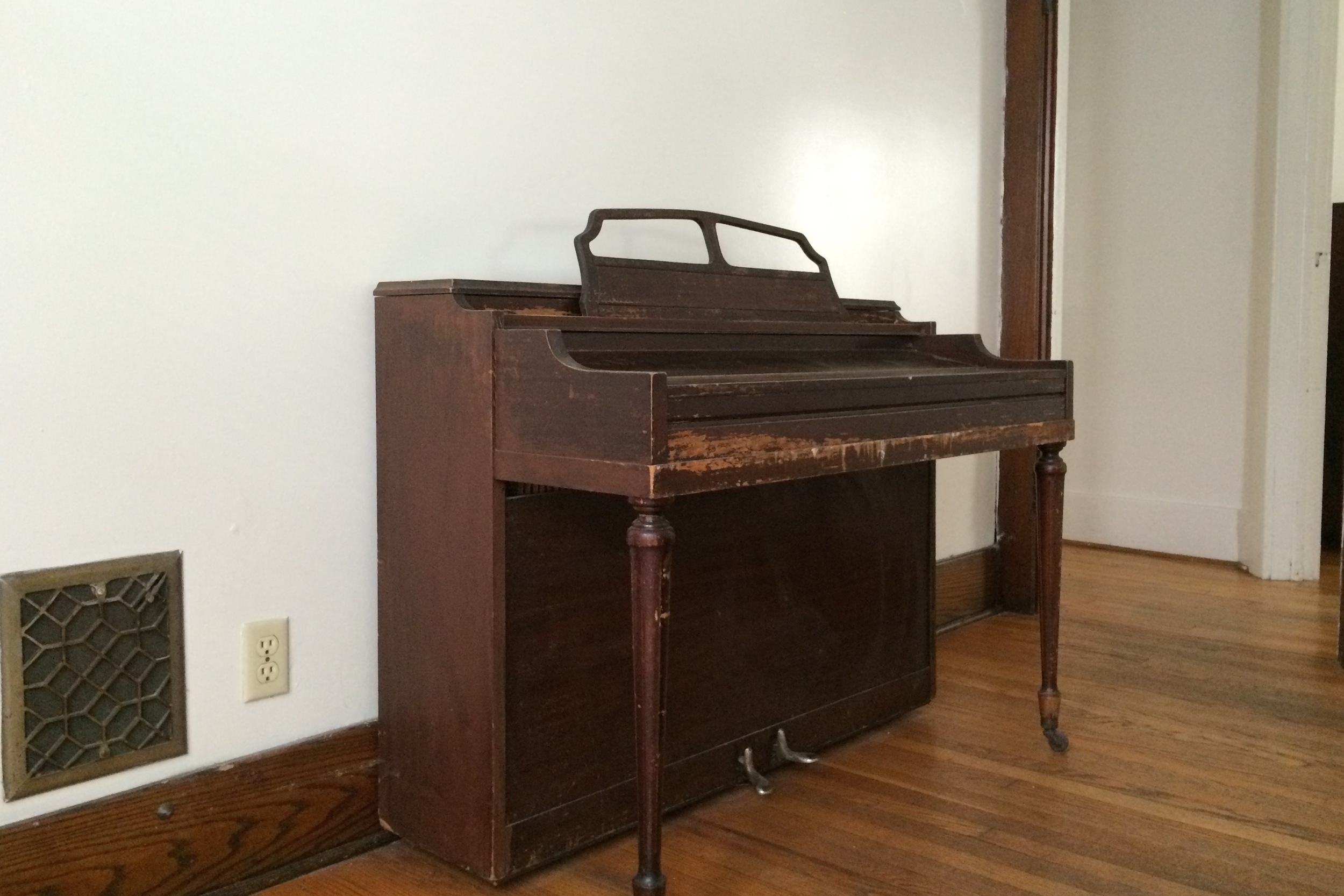 piano (untuned) in dining room