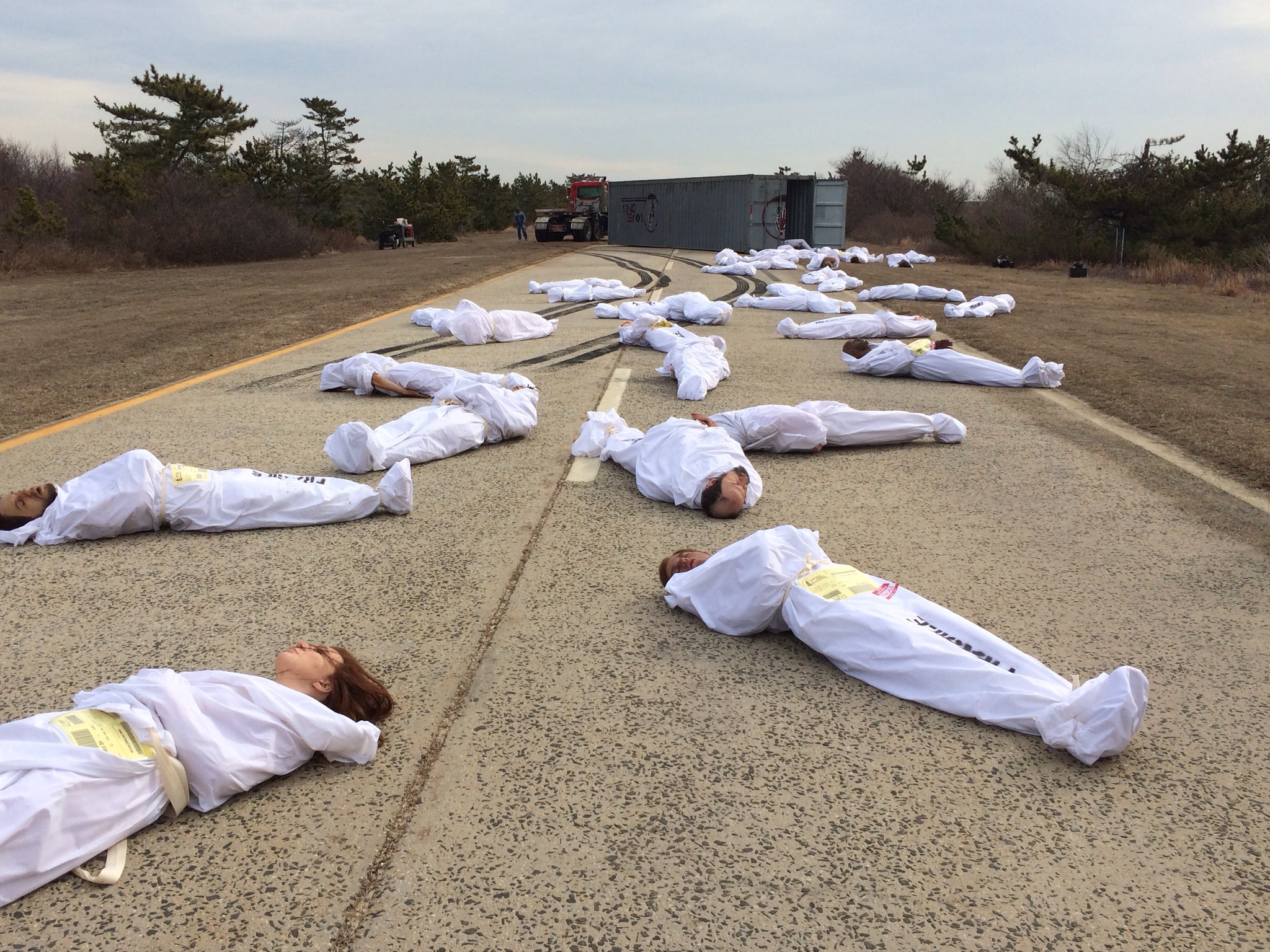 18 bodies in road 2.JPG