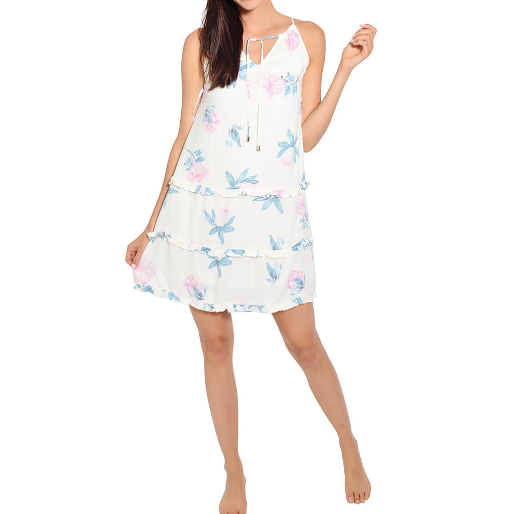 The dress: Woratah Drop Hem Dress by Minkpink. It may be white, which usually scares me away due to fear of being see-thru, but this one isn't at all. It also has a great shape for being a shift dress. Shift dresses don't always fit me very nicely but this one is perfectly designed to seem more fitted than it is, while also being comfy and flowy enough for a girls' night out or a dinner by the beach.
