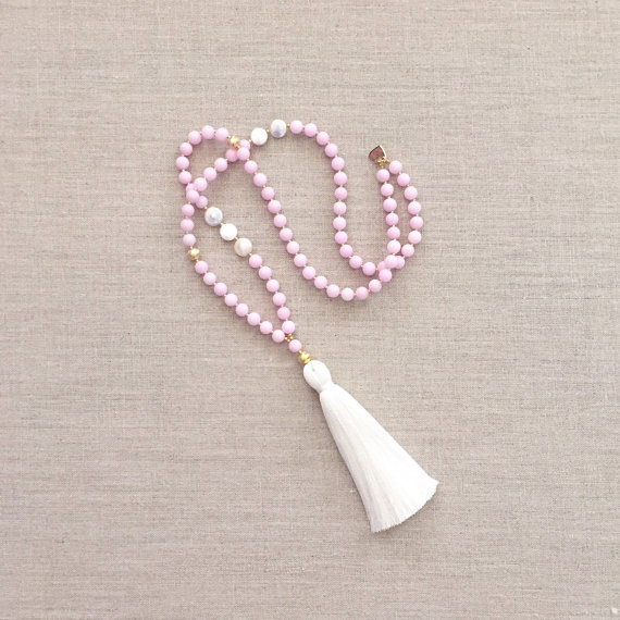 The necklace: Harper Tassel Necklace . I picked this necklace because of the gorgeous pastel pink color, also noticing that I would get it for free because I had already picked the dress on sale. It wasn't until I brought both items to checkout and lay them next to one another that I noticed how perfectly they went together. 