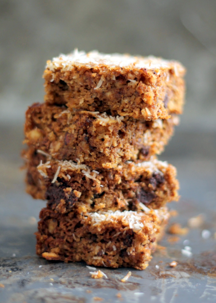 Pumpkin Almond Butter Bars , because sometimes plain old brownies just get boring. These are filled with two of my favorite flavors -- pumpkin and almond butter -- and garnished with chocolate chips and coconut, but you can alter them however you like. 