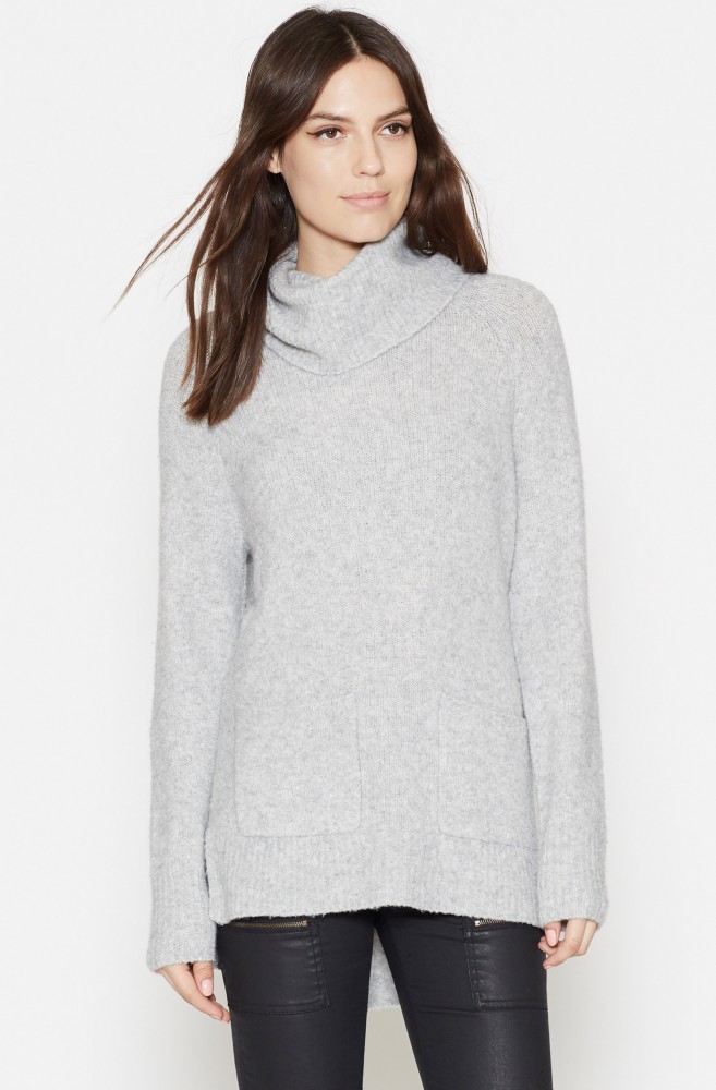 Everybody needs a soft gray sweater to pair with black jeans on the dreary fall mornings when color is just not the move. This Joie Agnetha Sweater is such a light gray that it keeps an outfit airy and bright without adding color. The front pockets also add a little flair and the loose turtleneck is so in style right now. 
