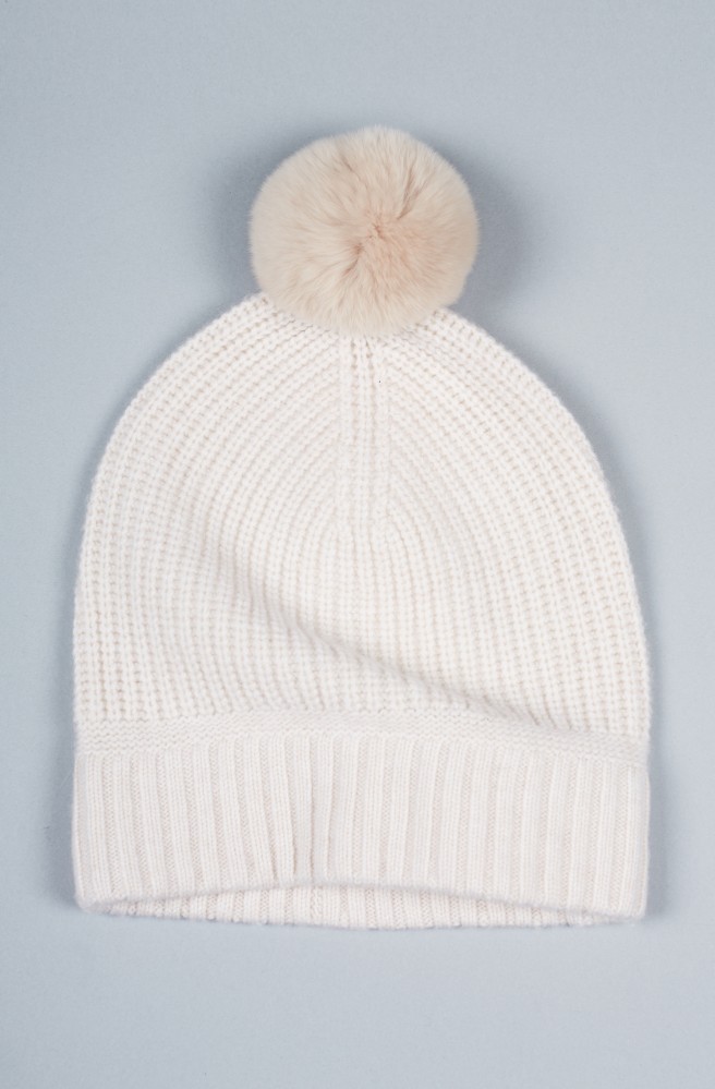 Every fall wardrobe needs a super cute hat to wear with any outfit on those chilly mornings. This super cute Mardelle Beanie is on the upper end of the price spectrum, but you'll look amazing in such a clean, soft color, and the pom pom on top just totally completes it!