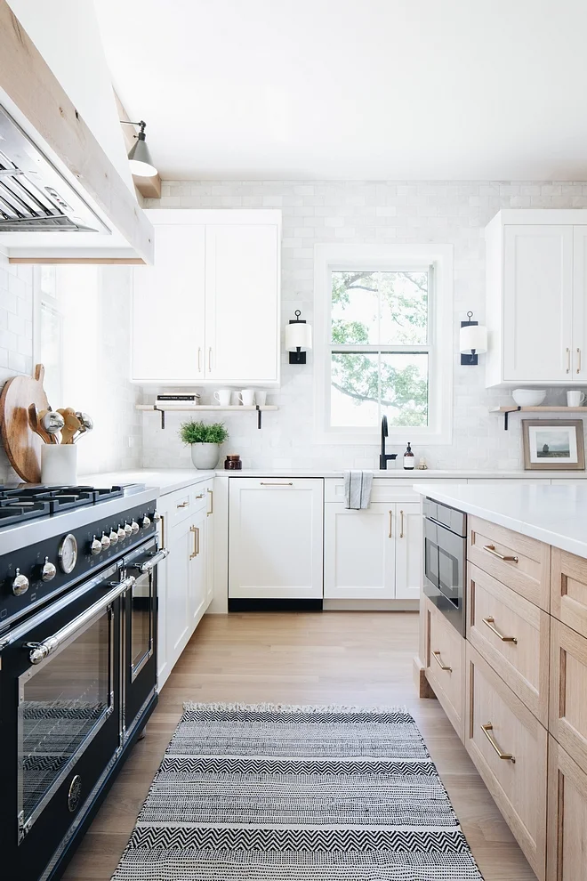 The kitchen range is a Bertazzoni Professional range in black