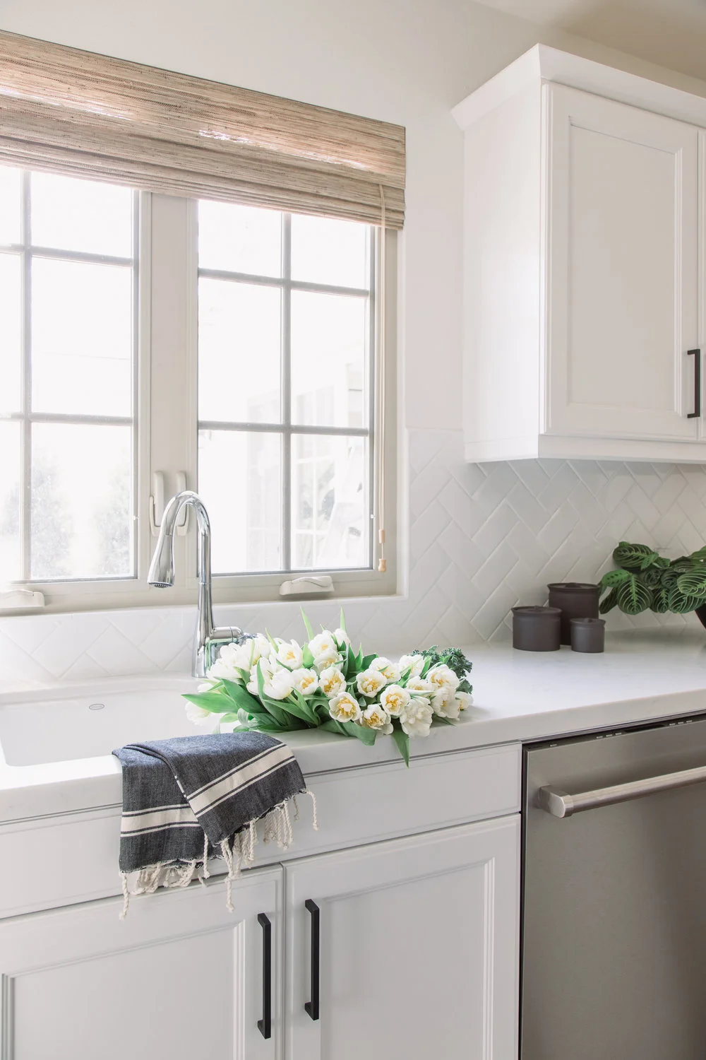 The herringbone subway tile backsplash is almost invisible, but just enough to give it texture that pops out.