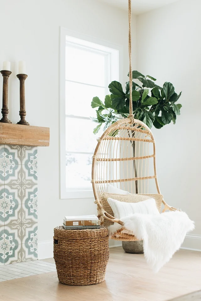 The swing in the corner really completes the whole look. These are from Serena & Lilly and I might need to buy one to read my books in. You also catch some closeup detail of that stunning fireplace here. “ I kept seeing the hanging chairs from Serena and Lily coming through my IG feed and I was inspired to build a house that would be worthy of those cool chairs.” -Julie Howard