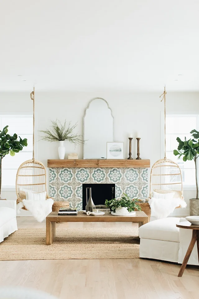 I am OBSESSED with the tiling on the fireplace. It really adds a unique focal point without making the room too busy. The mirror above the fireplace makes for an almost invisible piece of artwork; it’s angled upward to reflect the natural light bouncing off the ceiling. Tile is from The Tile Shop – Cement Encaustic Tile