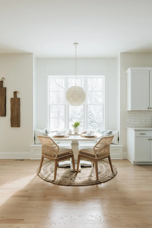 The breakfast nook is just dreamy; it’s the perfect spot to sit in the morning sun and drink coffee. The pendant is from Ballard Designs and is simply stunning. It would be perfect in a little girl’s room as well.