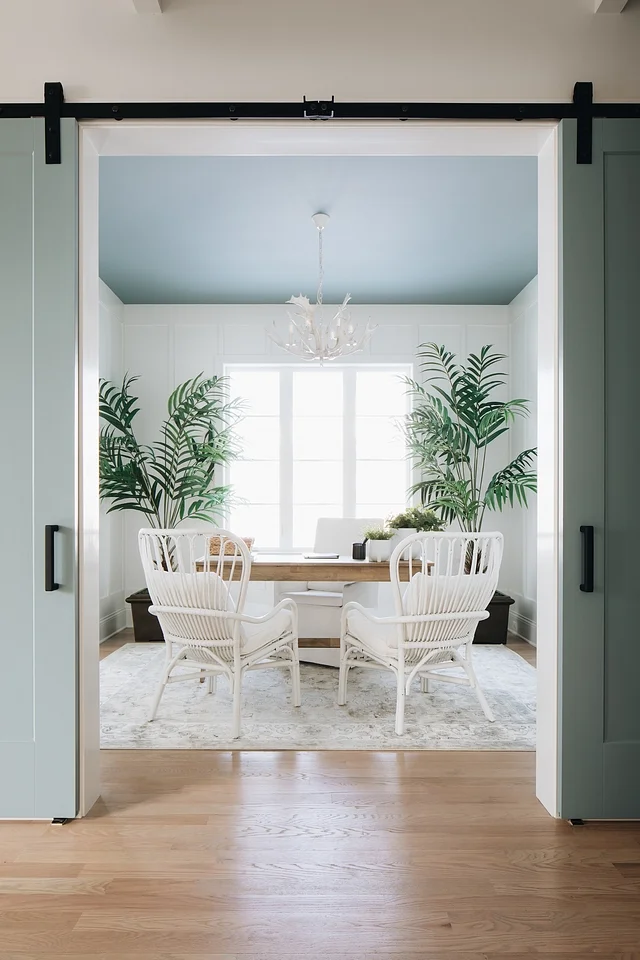 Now those are some chairs I’d love to have a meeting in. They were originally black chairs from Ikea but the designer had them painted white.
