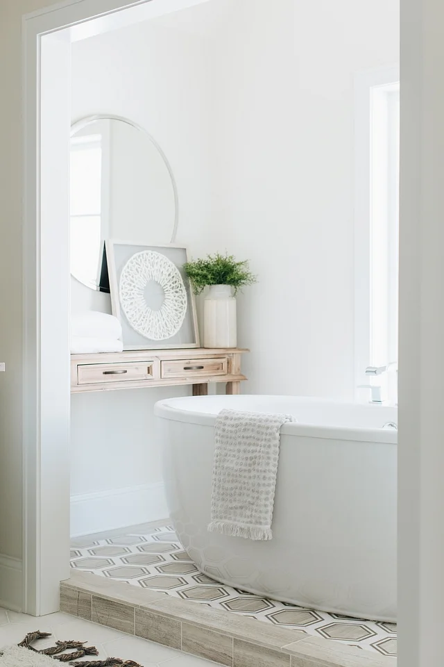 This bathtub looks so dreamy, and I absolutely love the tile work underneath it. The whole space is a work of art.