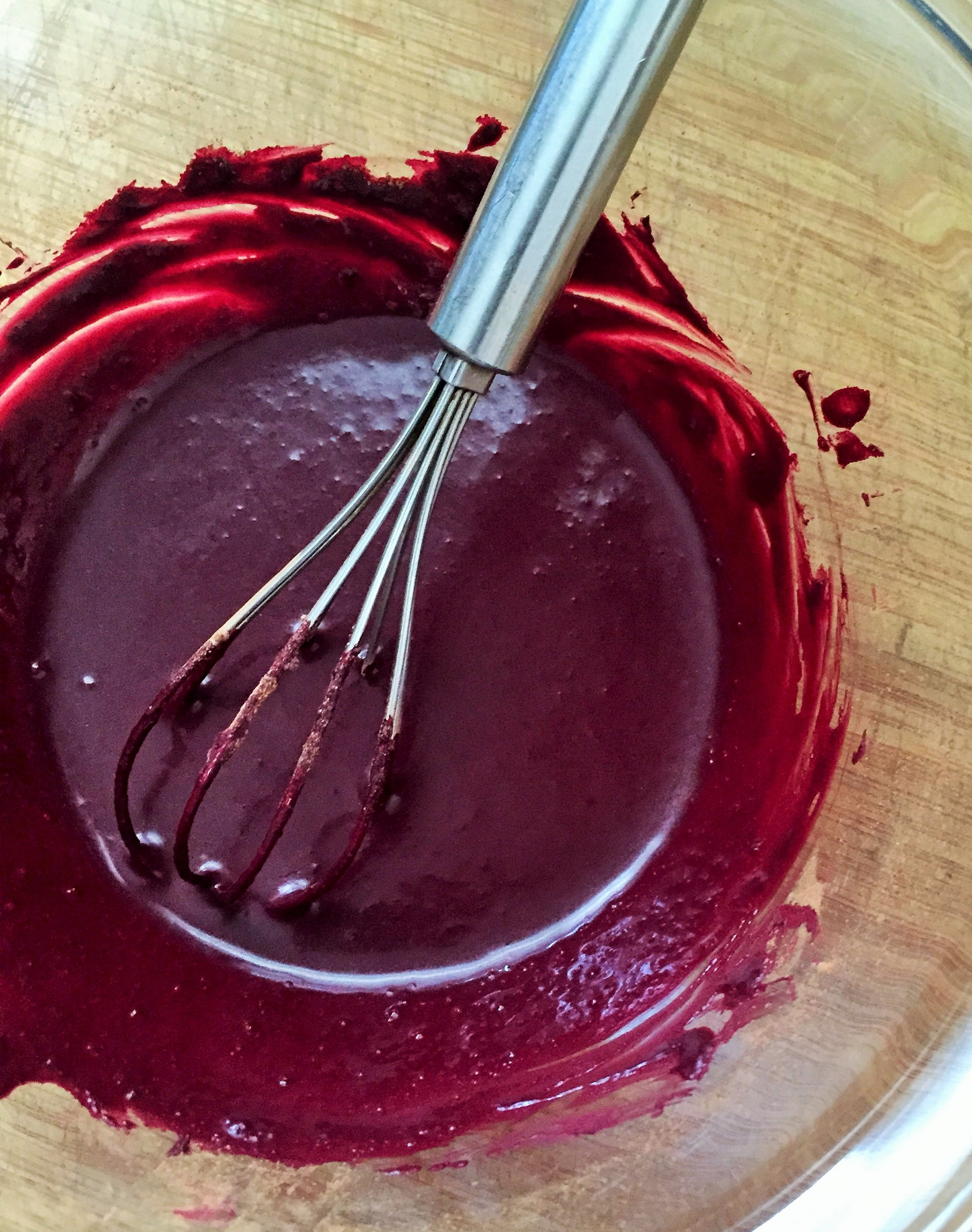 Cocoa powder and food colouring mixed into smooth paste