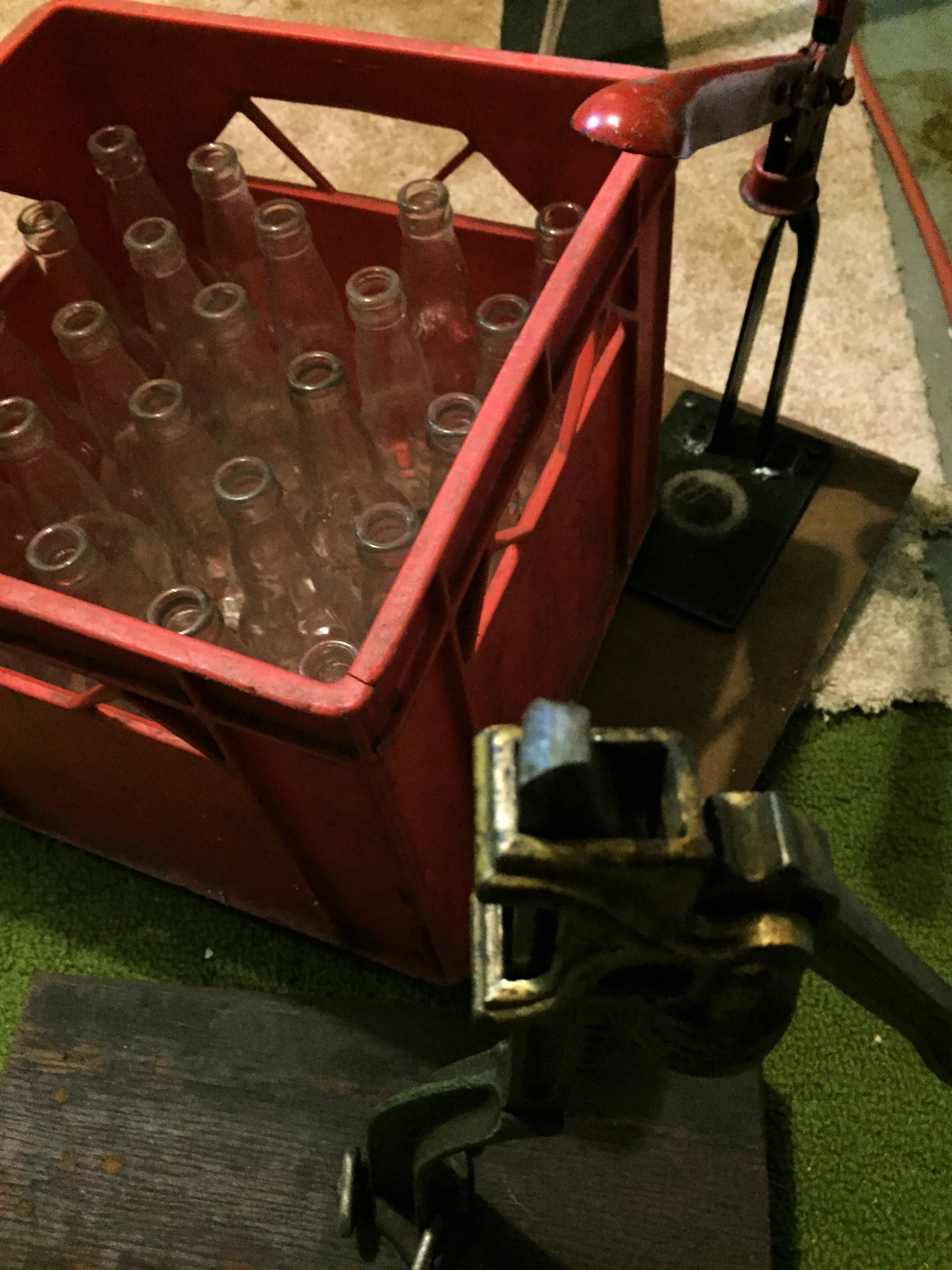 Mom's basement: Capping gadgets and old beer bottles used for bottling tomato sauce.