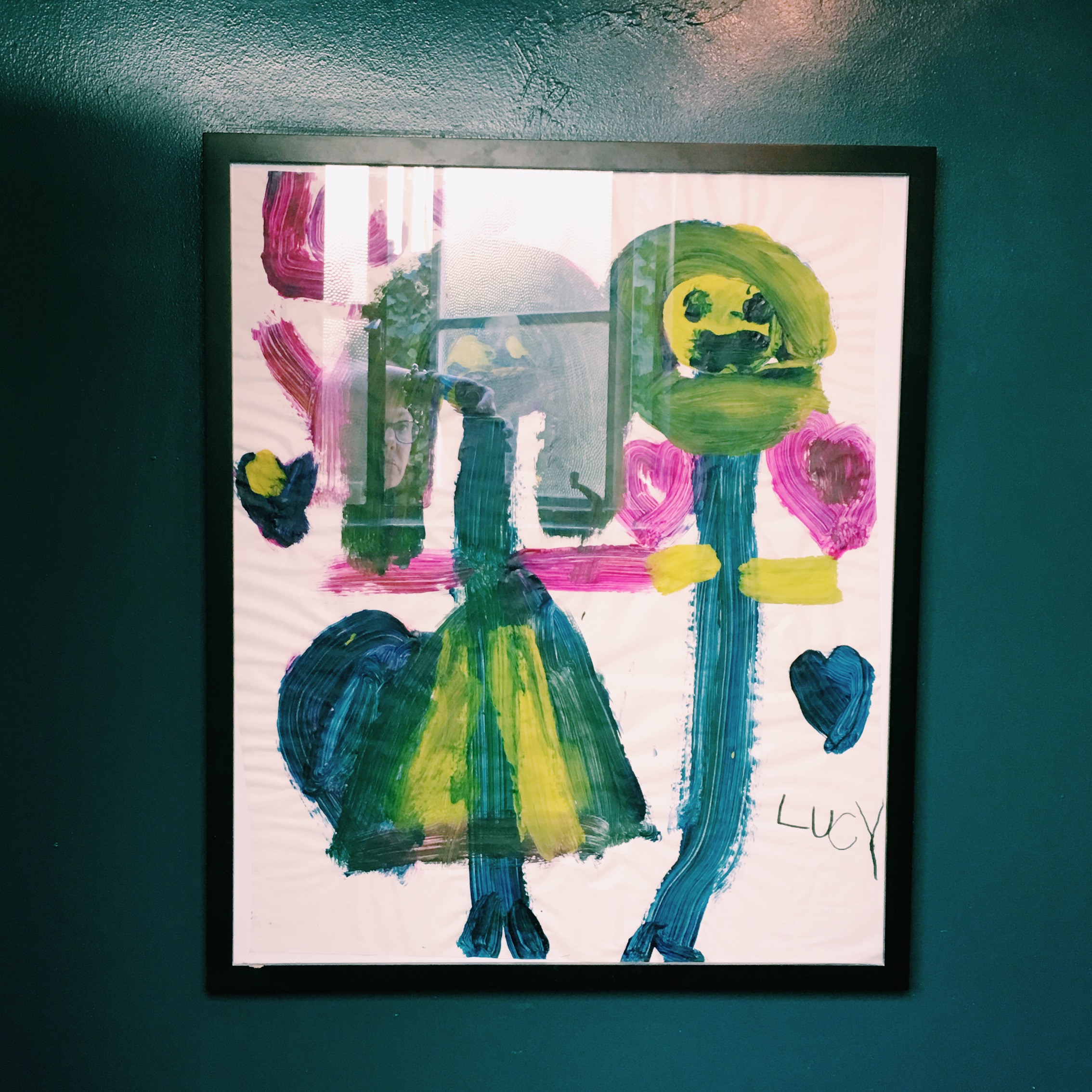 This is my daughter, Lucy's, artwork. I frame the pieces that are extra special. This one really wanted to be in here.