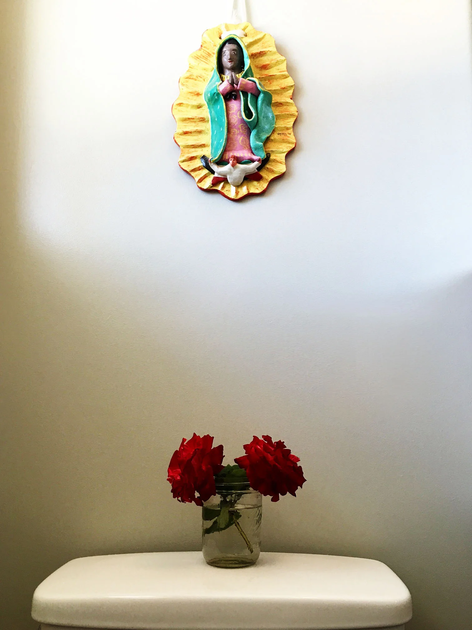 Here's my beloved black Lady of Guadalupe. One of my treasures from when we lived in Mexico.