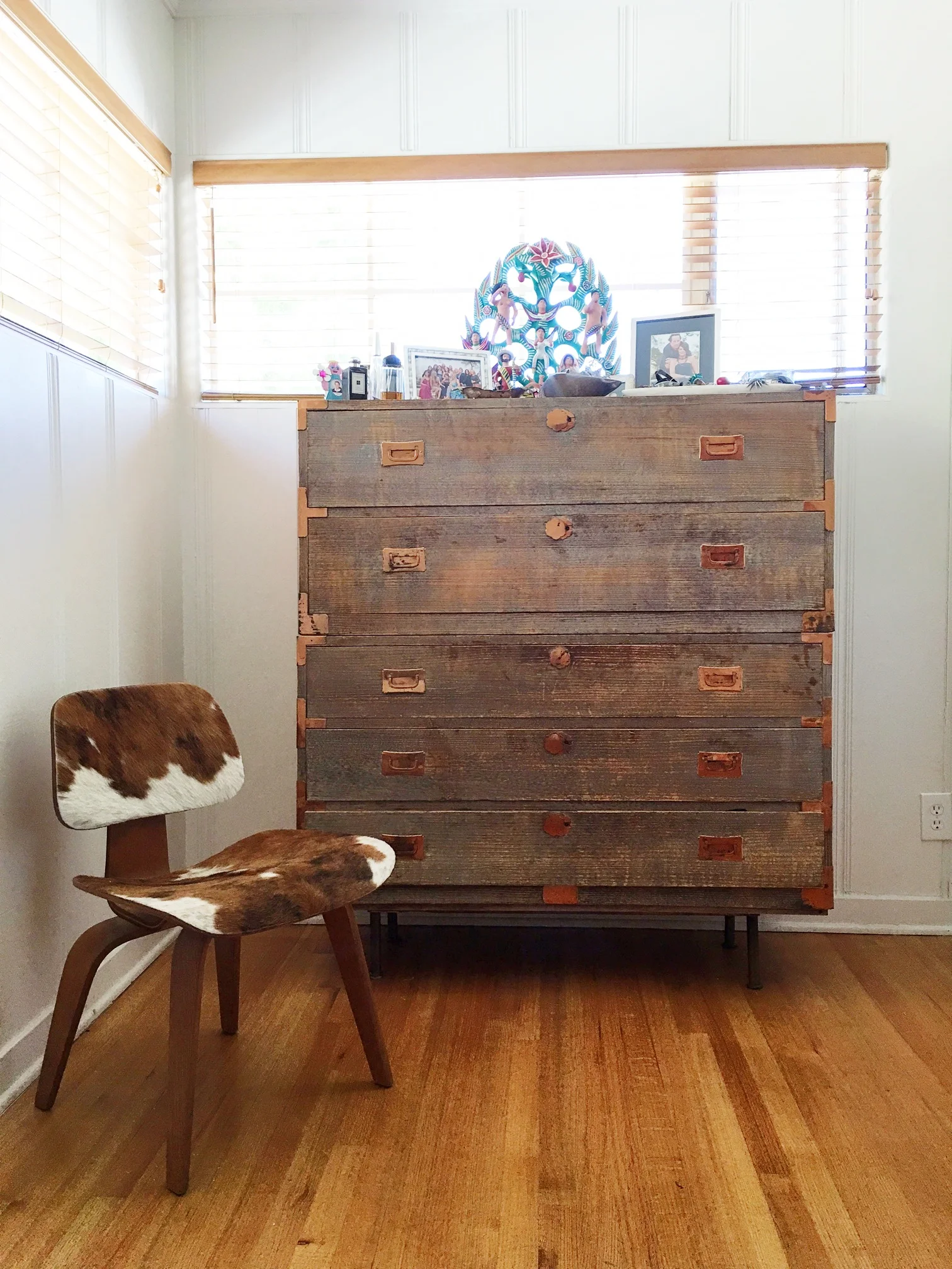 While I'm at it, I'd love to share with you some of my favorite things in my room. This dresser is one of my favorite pieces. It's actually two chests put on top of each other with legs. I bought it in Mexico from this very eccentric woman who had an incredible selection of antiques. This one is a couple hundred years old from China. It even has the stickers inside to prove it.