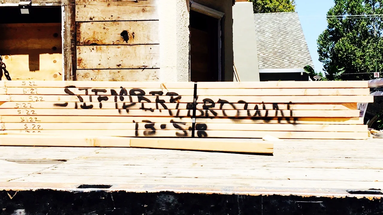 Just love this picture with our names spray painted on the trusses before they are hoisted up.