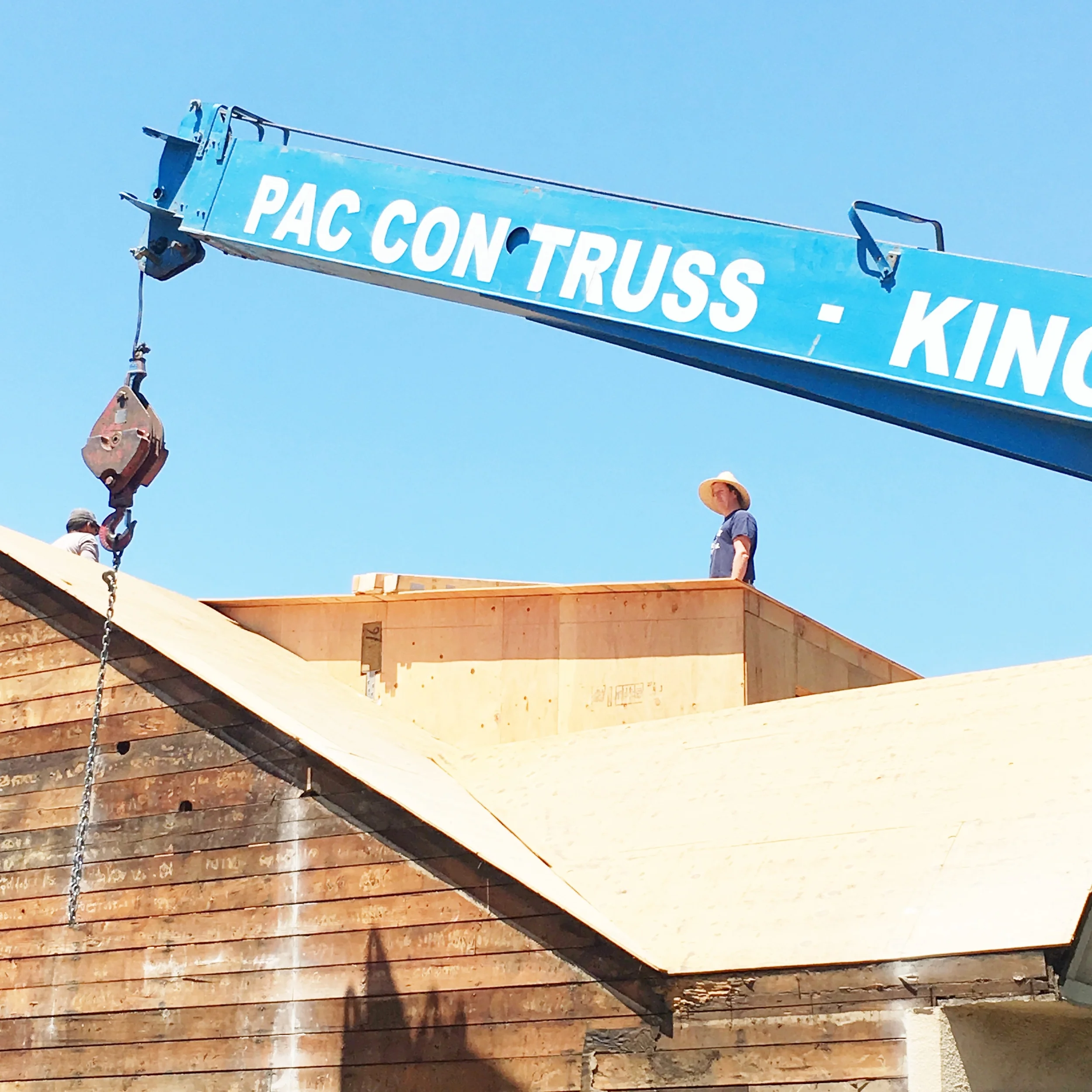 Just a cool shot of Lance on the roof waiting for the crane to start doing its stuff.