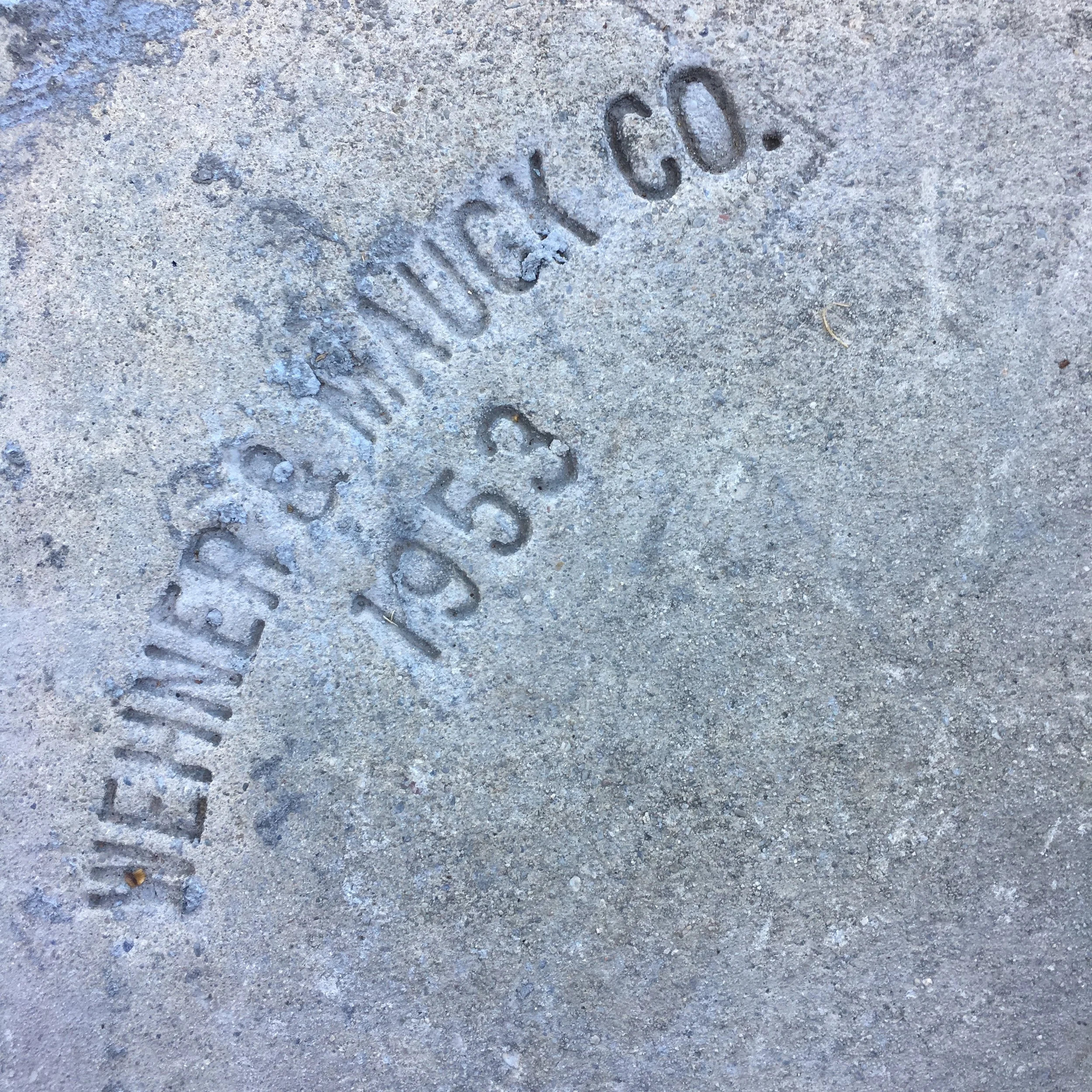 This is the stamp from the sidewalk in front of weaver. I love these stamps. I wish we had a stamp. It sort of sears things in time. Speaking of cement, look what we just got...