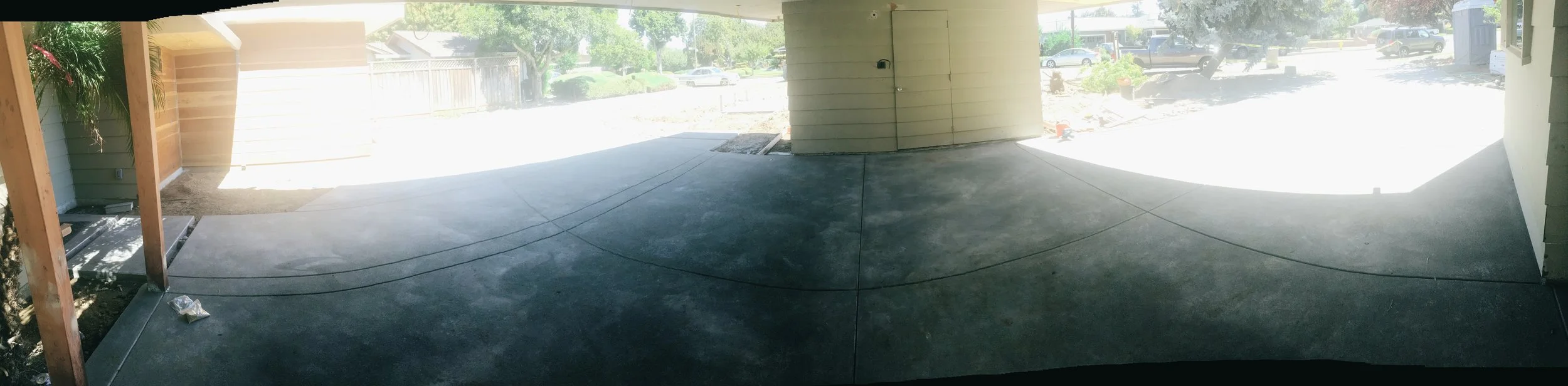 It's hard to capture the driveway so here's my attempt with a pano shot but it doesn't do it justice. It really turned out gorgeous. Except for the postman that walked across it before it was cured. No, not joking. But that's a story for another day.