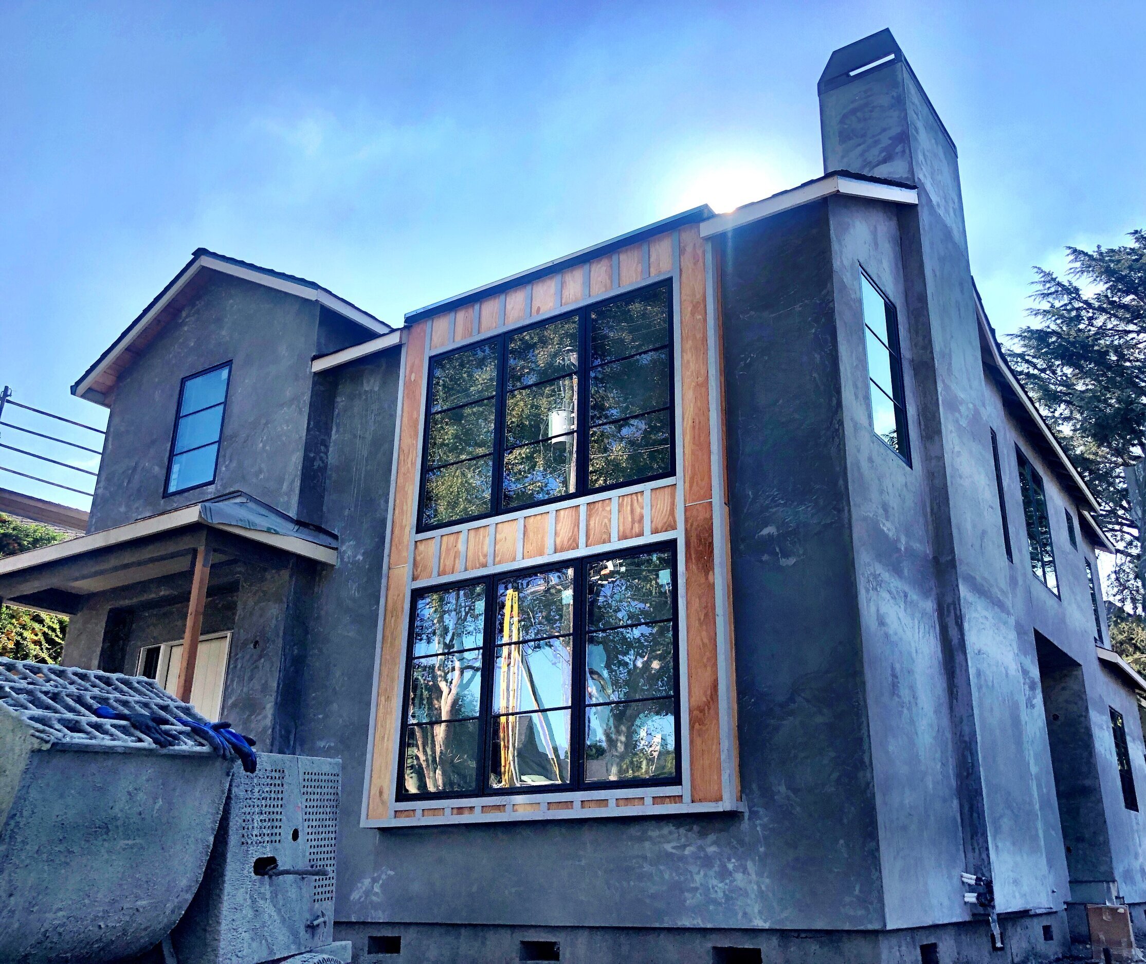 Excuse the cement mixer in the foreground. House has been stucco’d and is ready for paint!
