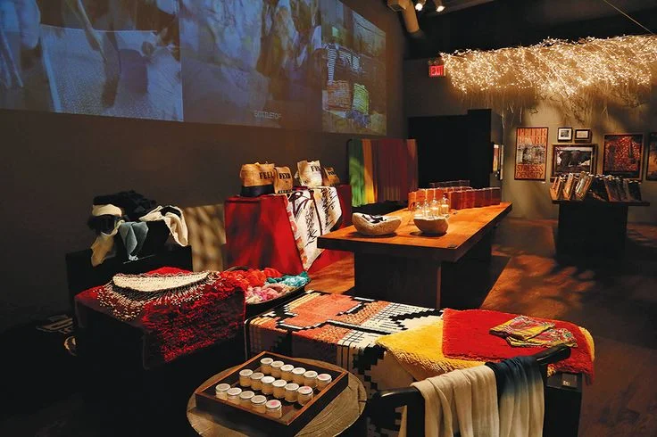 Carini Lang's graffiti rugs and cashmere shawls at the 2014 Holiday Marketplace