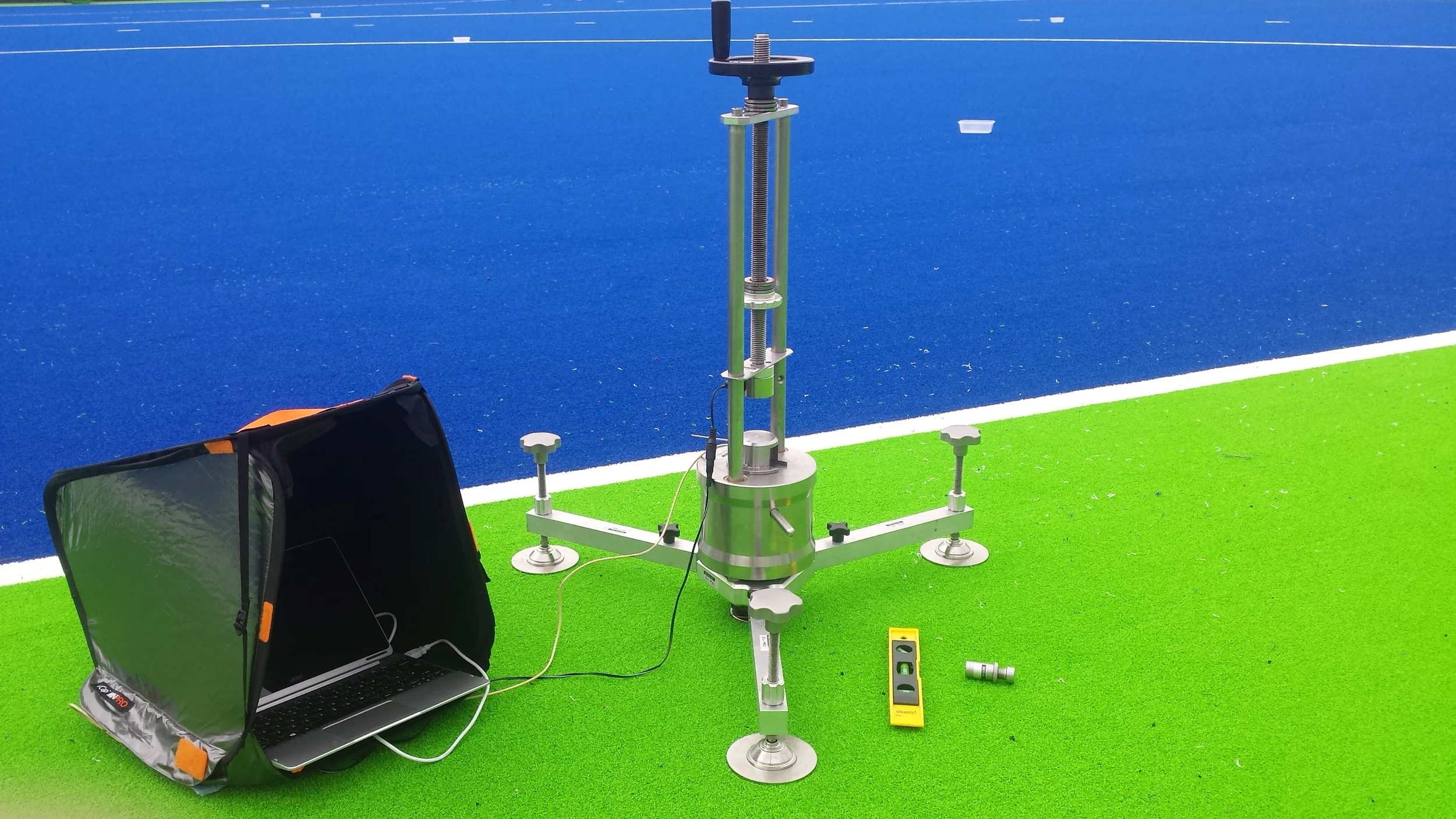 This photo shows the Advanced artificial athlete testing the artificial turf system at the Olympic venue