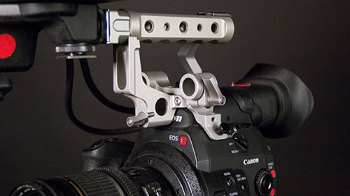 MovCam top handle features three 15mm rod holes for mounting gear.