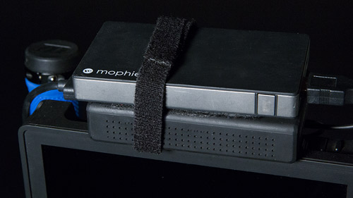 Receiver uses a velcro'd USB battery, which lasts 2+ hours.