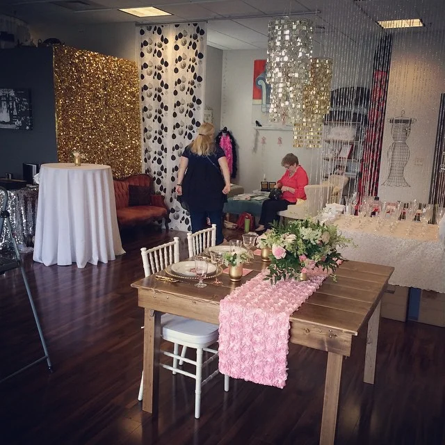 Behind the scenes, preparing for a wedding vendor boutique.