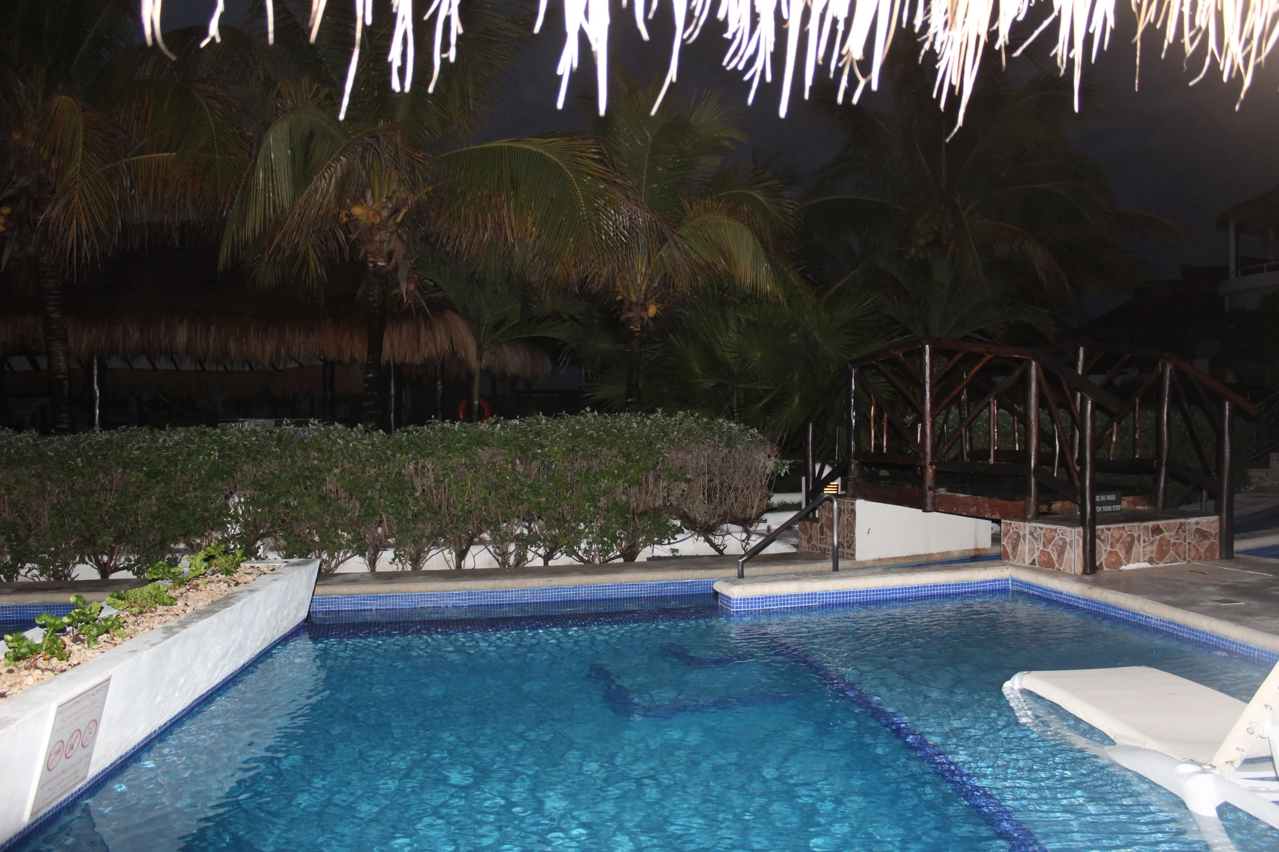 View of our pool at night! 