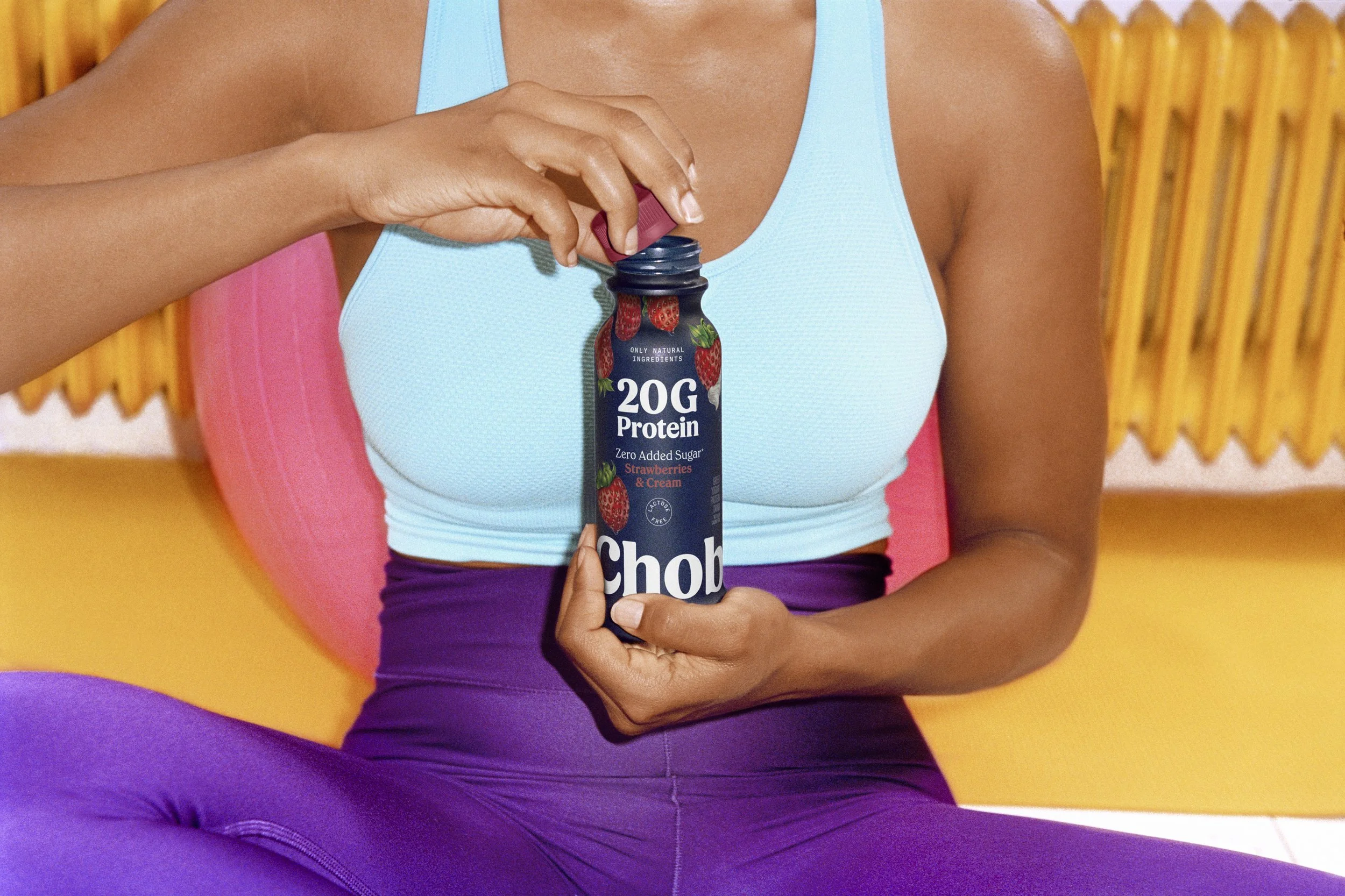 CAMP_2024_HPY_Lifestyle_Yoga_CloseUp_1-Drink_Strawberries-Cream_RGB_v3+(1).jpg