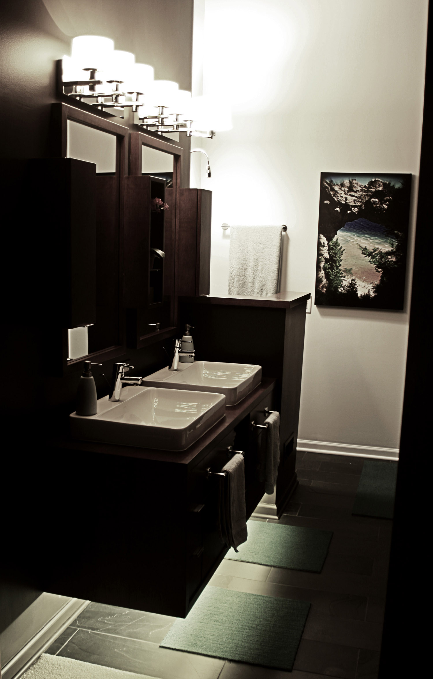 6 masterbath entry view of wall mount vanity night.jpg