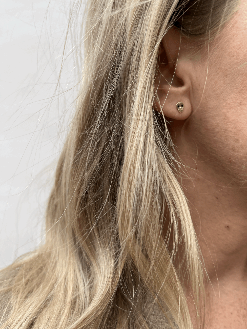 Tiny skull shop earrings