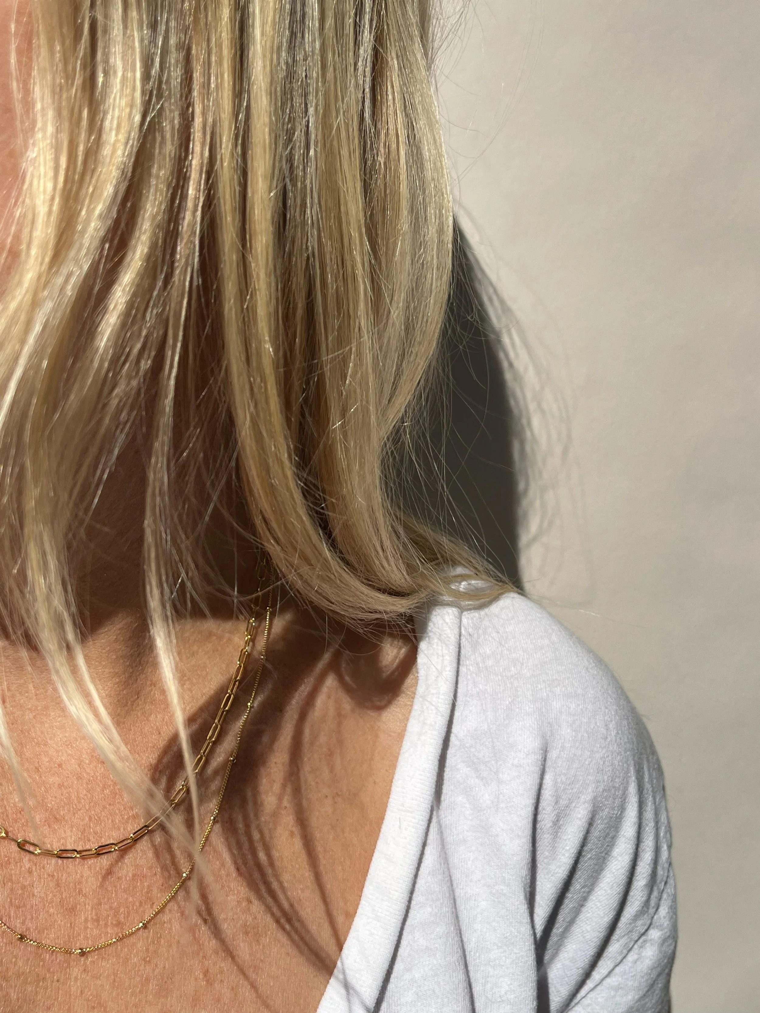 lifestyle shot of woman wearing original gold paperclip necklace | handmade Lafayette jewelry | THALKEN