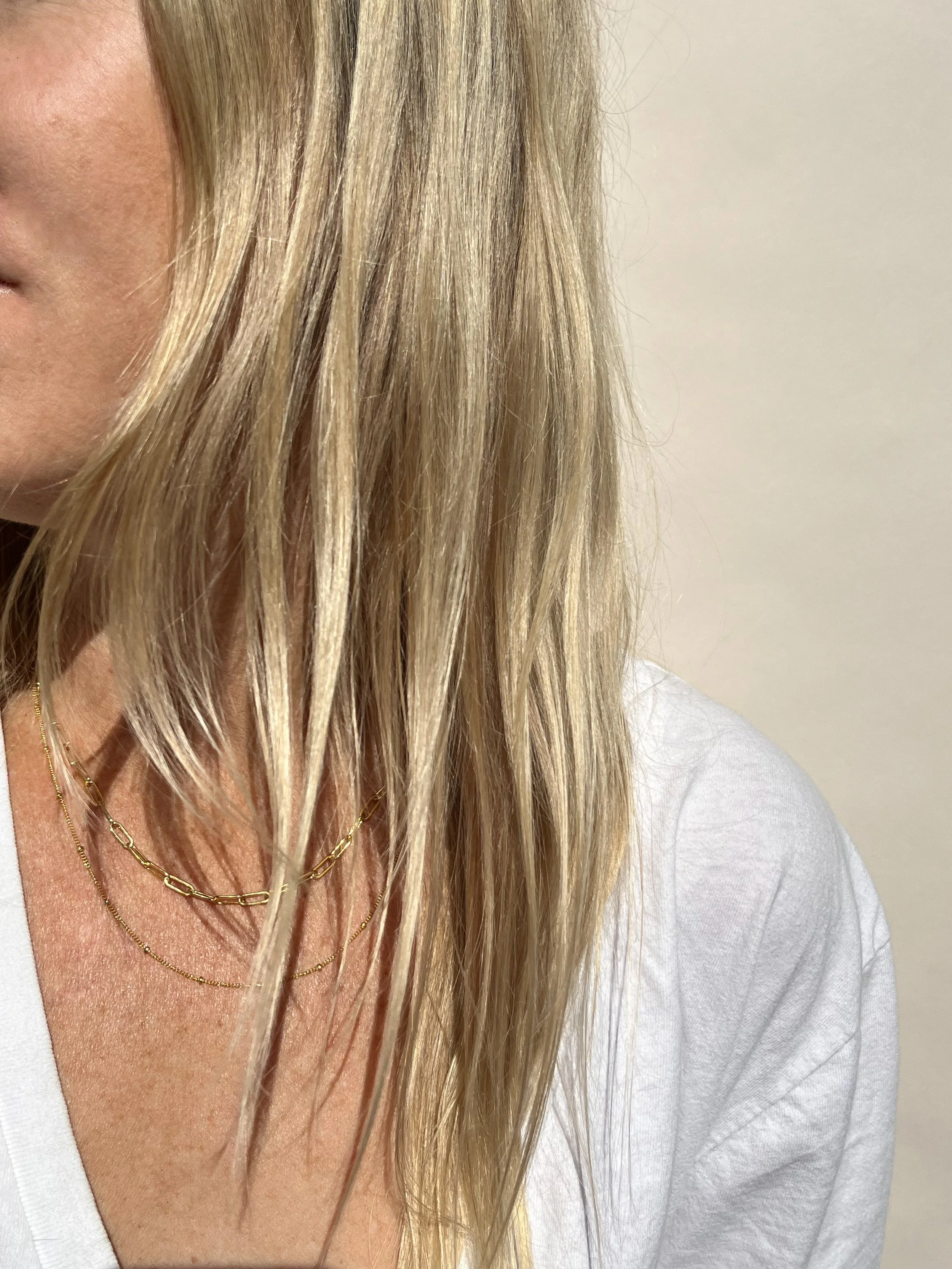 woman wearing small link paperclip necklace gold filled | handmade boulder necklaces | THALKEN