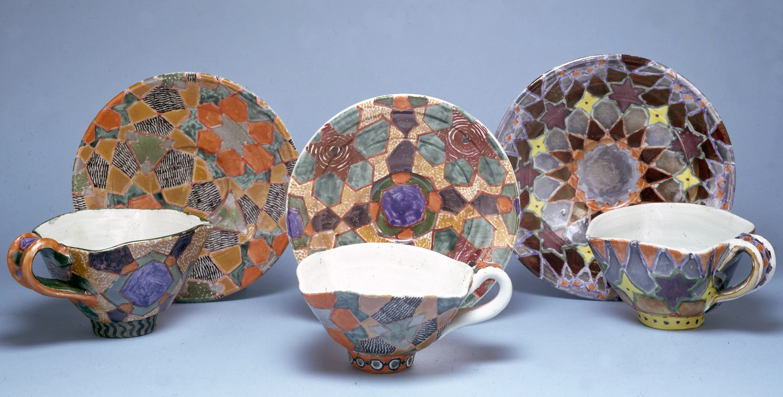cups (3 of 12), collab. Betty Woodman, 1980, glazed earthenware, saucers 5” diam.