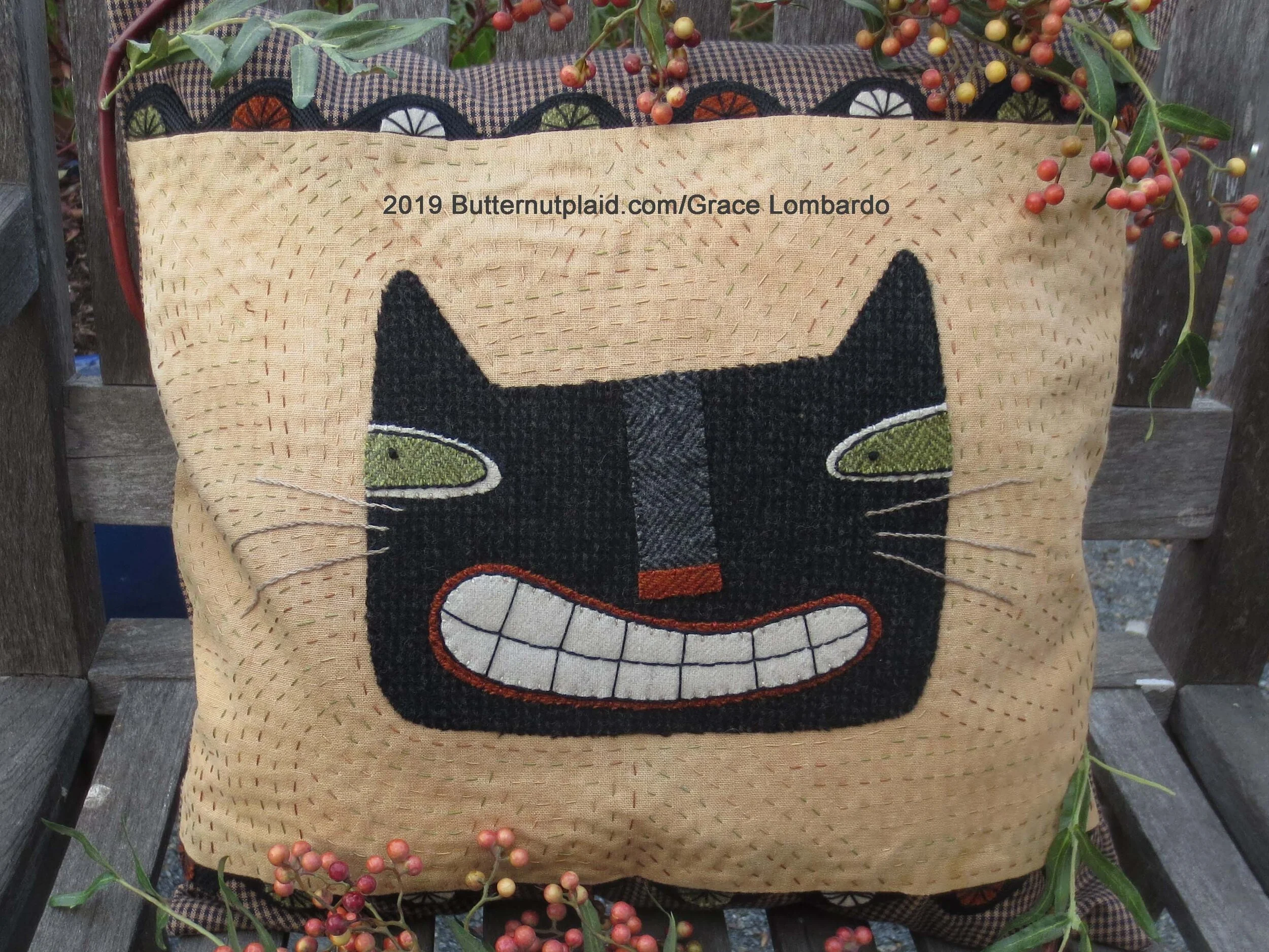 smiling cat pillow finished.jpg