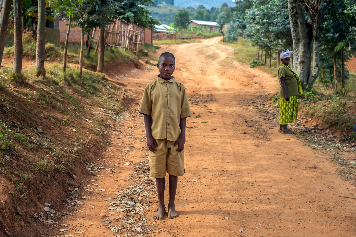  Student in his school uniform on the road to Kibuye 