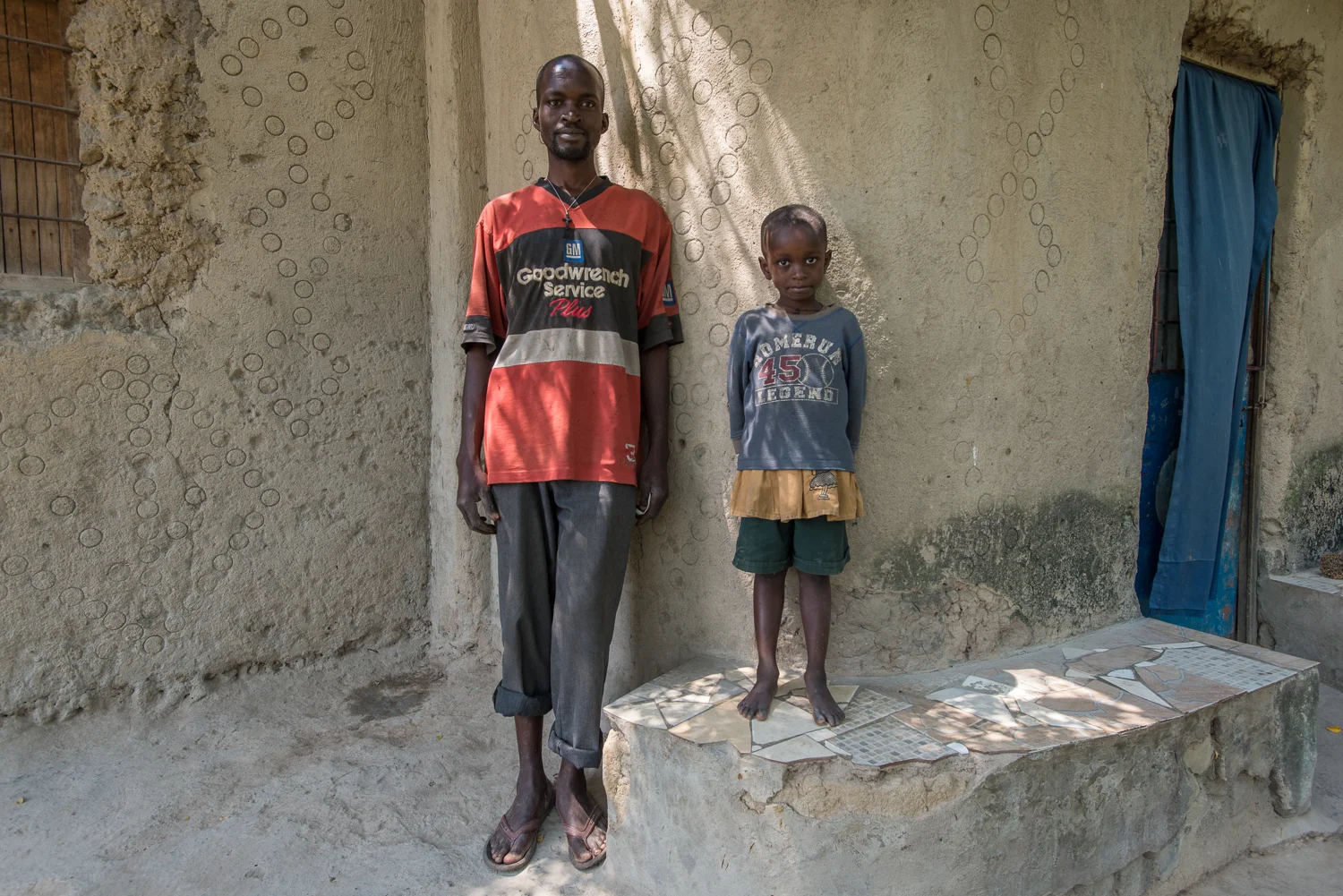 Father and son, Nyabisindu community, Kigali 