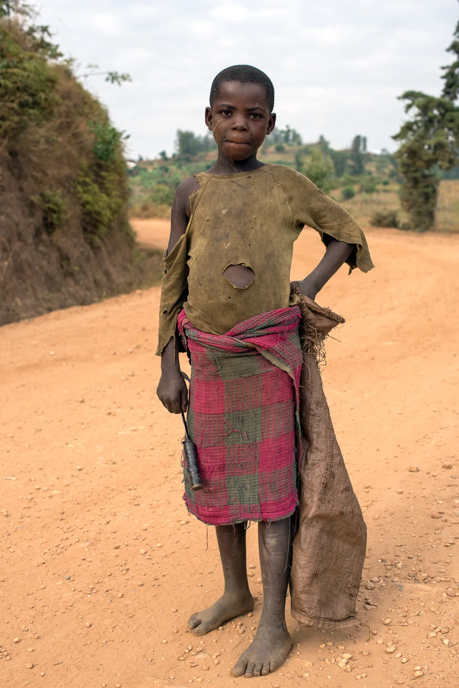  Boy with knife on the road to Gishyita 
