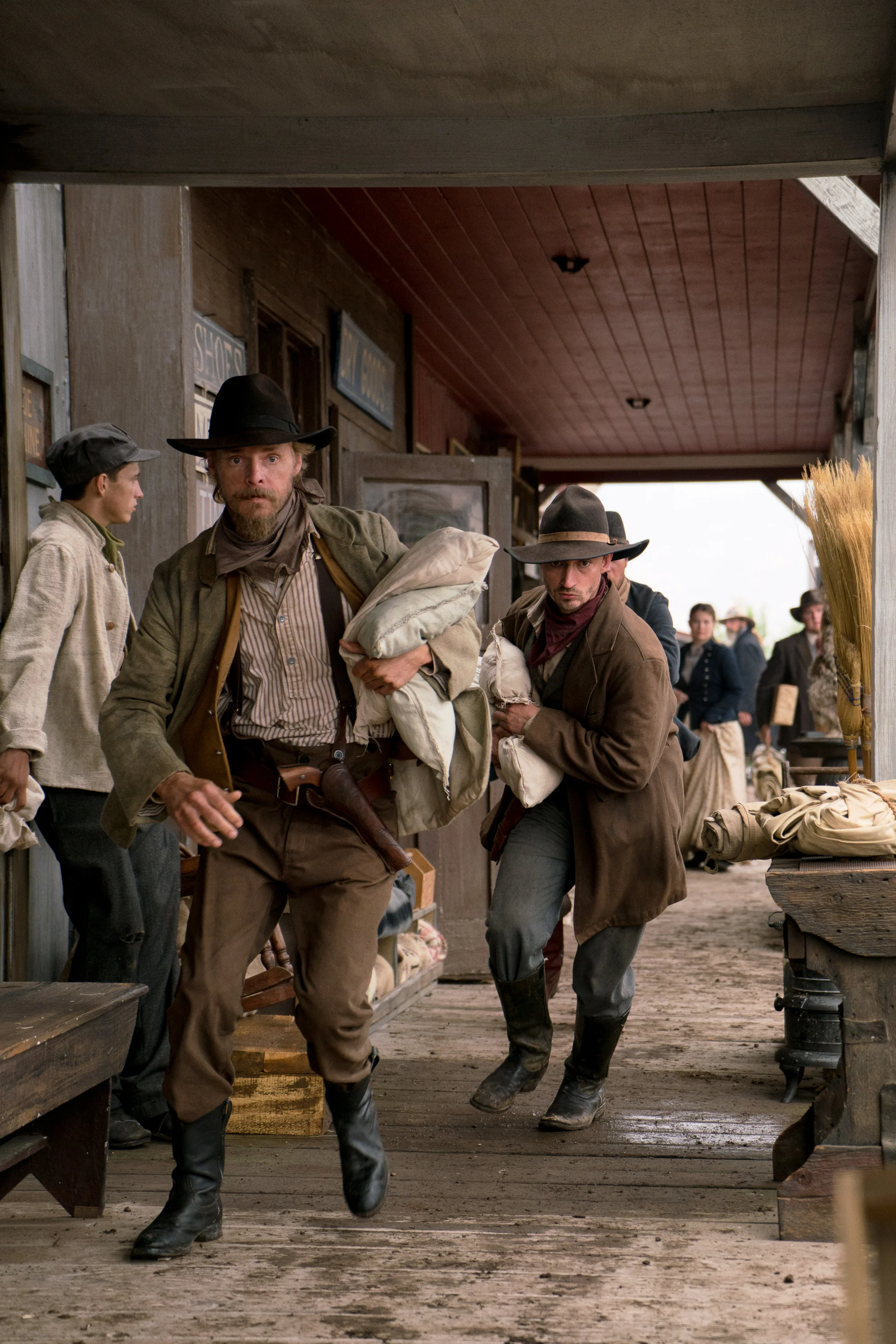 Jesse James played by David H. Stevens races off with his brother Frank James after robbing a general store on the set of The American West in Heber City, Utah.