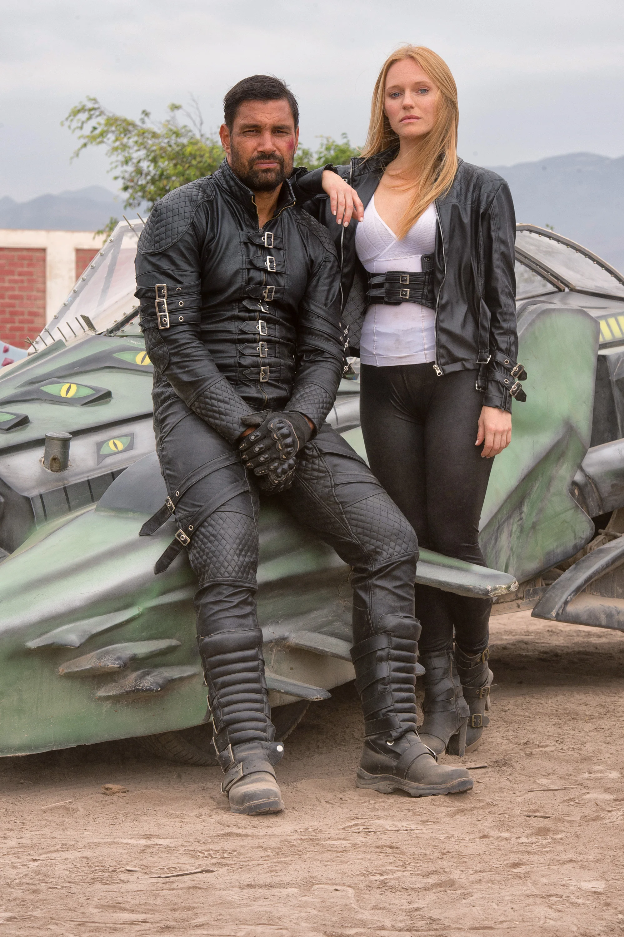 Annie (Marci Miller) and Frankenstein (Manu Bennett) at a checkpoint in Death Race 2050.
