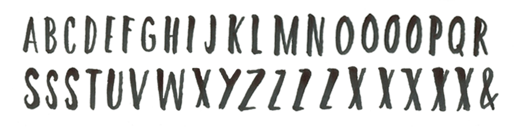 Using a brush tip, practicing the alphabet in my sketchbook.