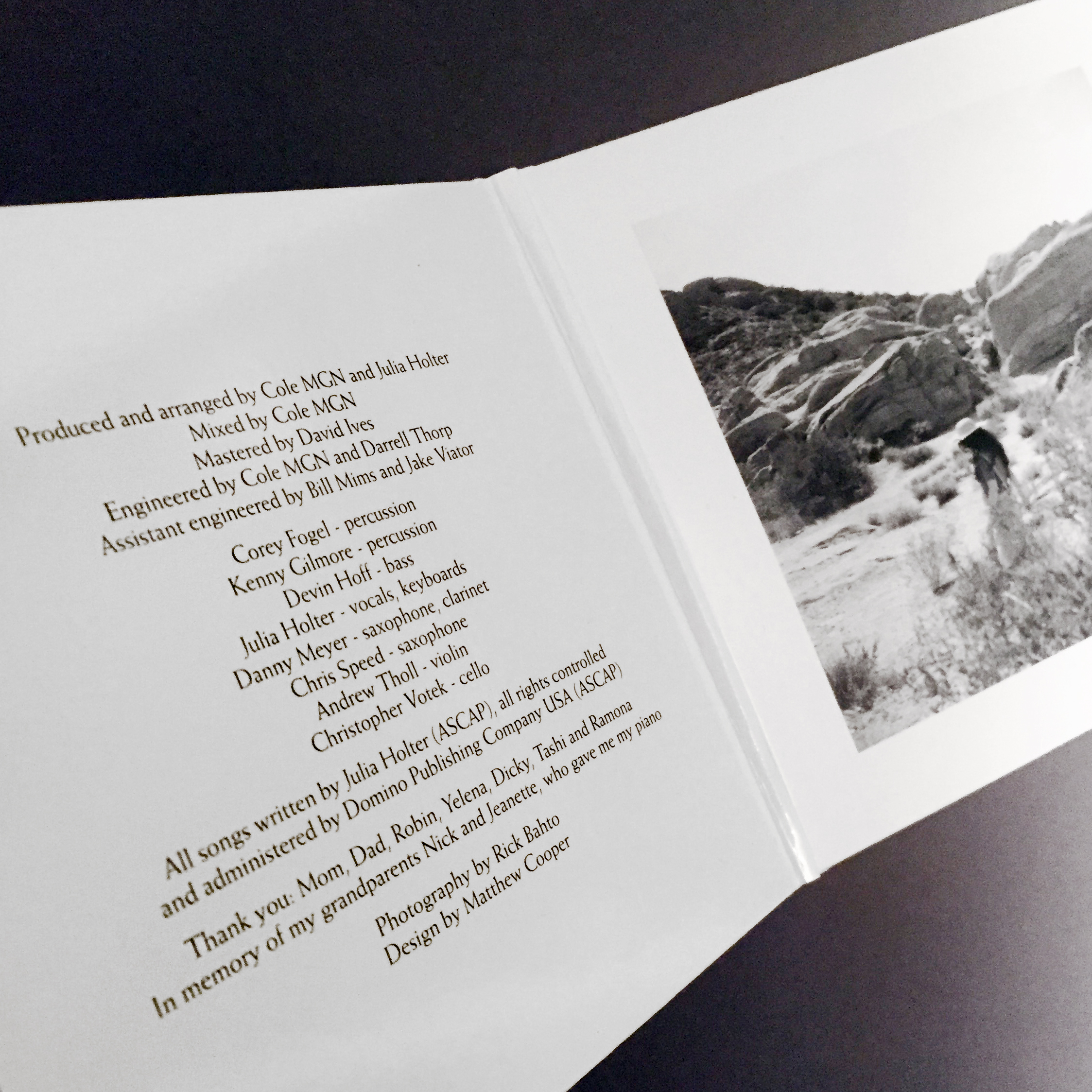 The credits on the inside flap, with a black-and-white photograph on the opposite flap.