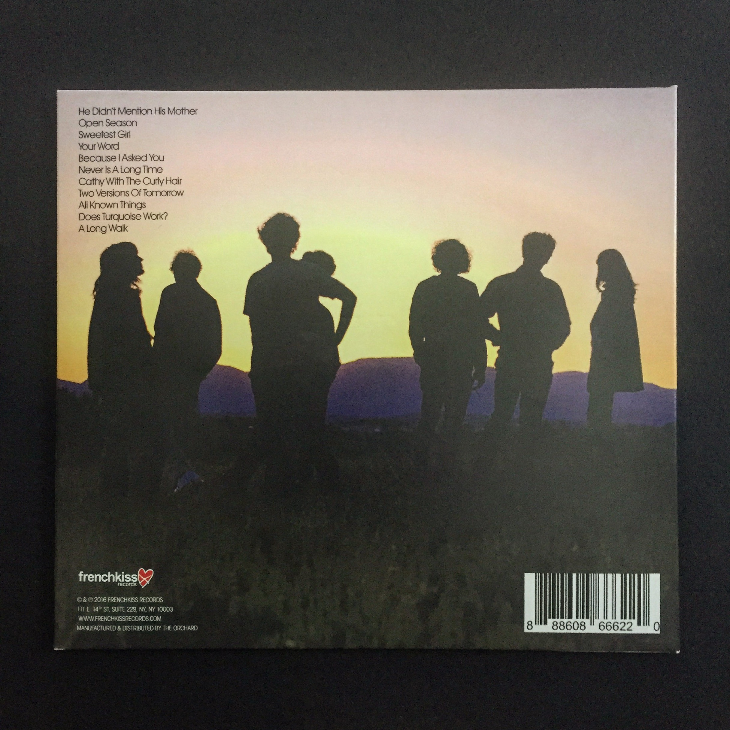 The back cover features ITC Avant Garde Gothic in the upper-left corner.