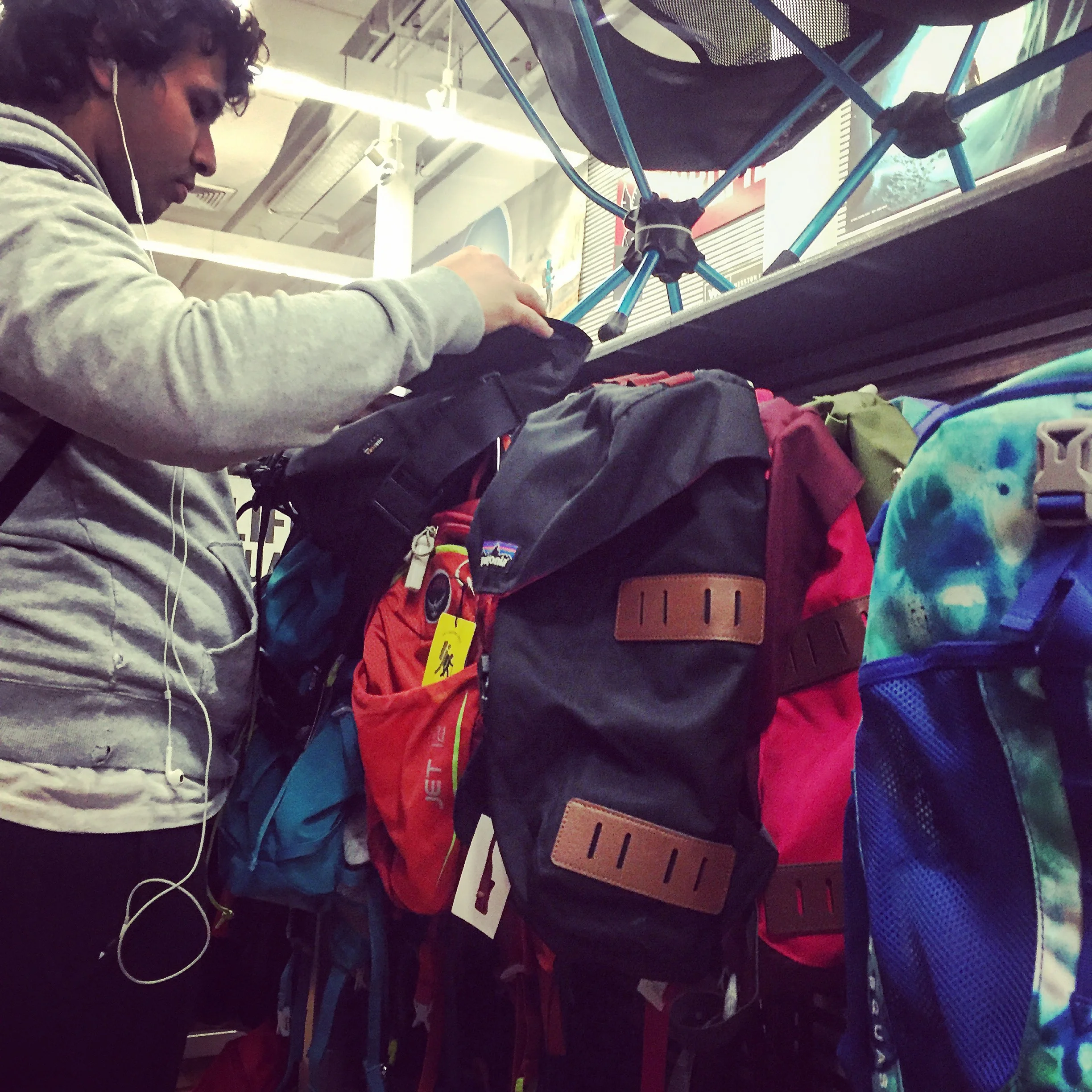 Trying on backpacks was very common among all the customers in the department.