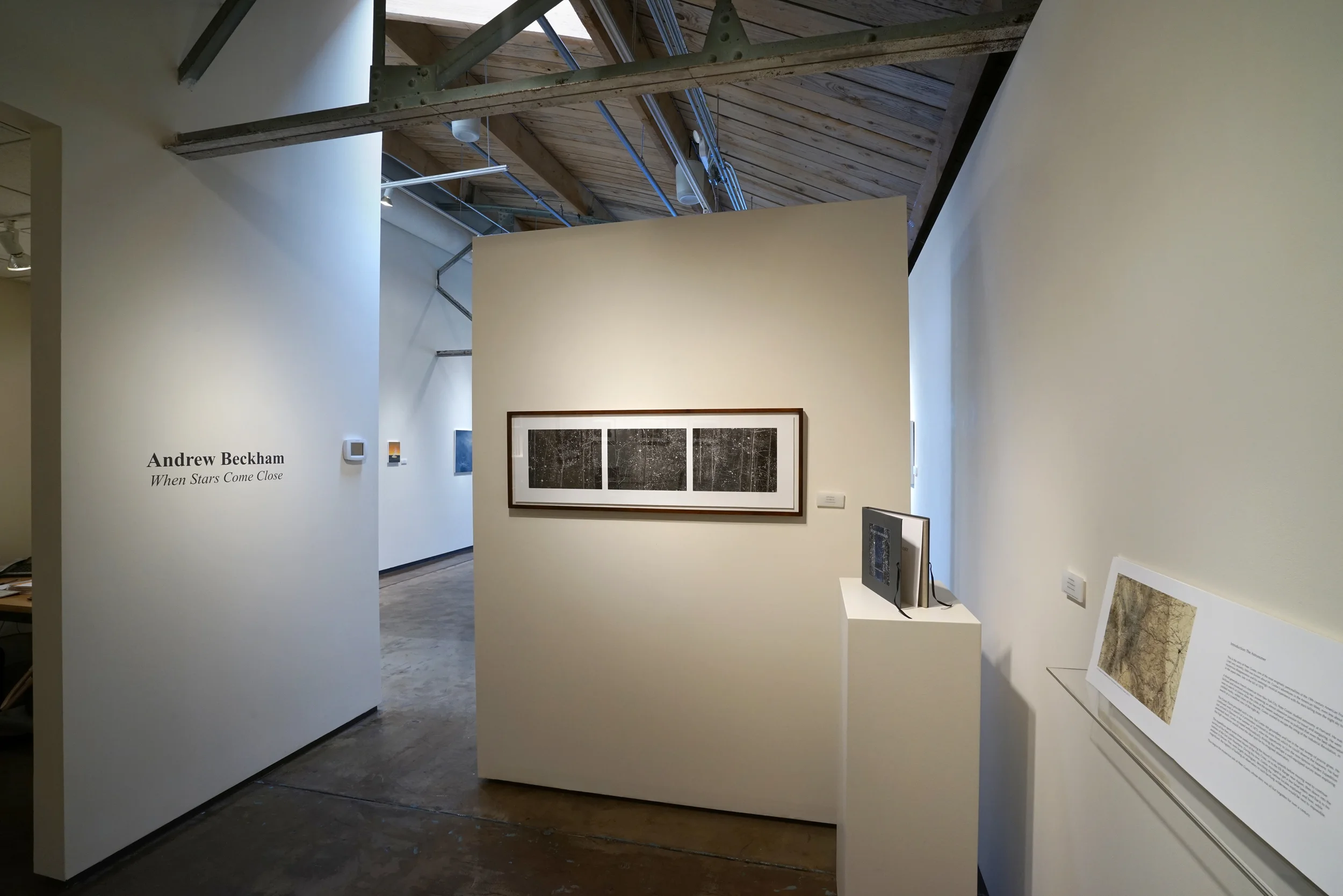 When Stars Come Close: Gustav's Observatory - An artist's book installed on-the-wall with photographs from the project.