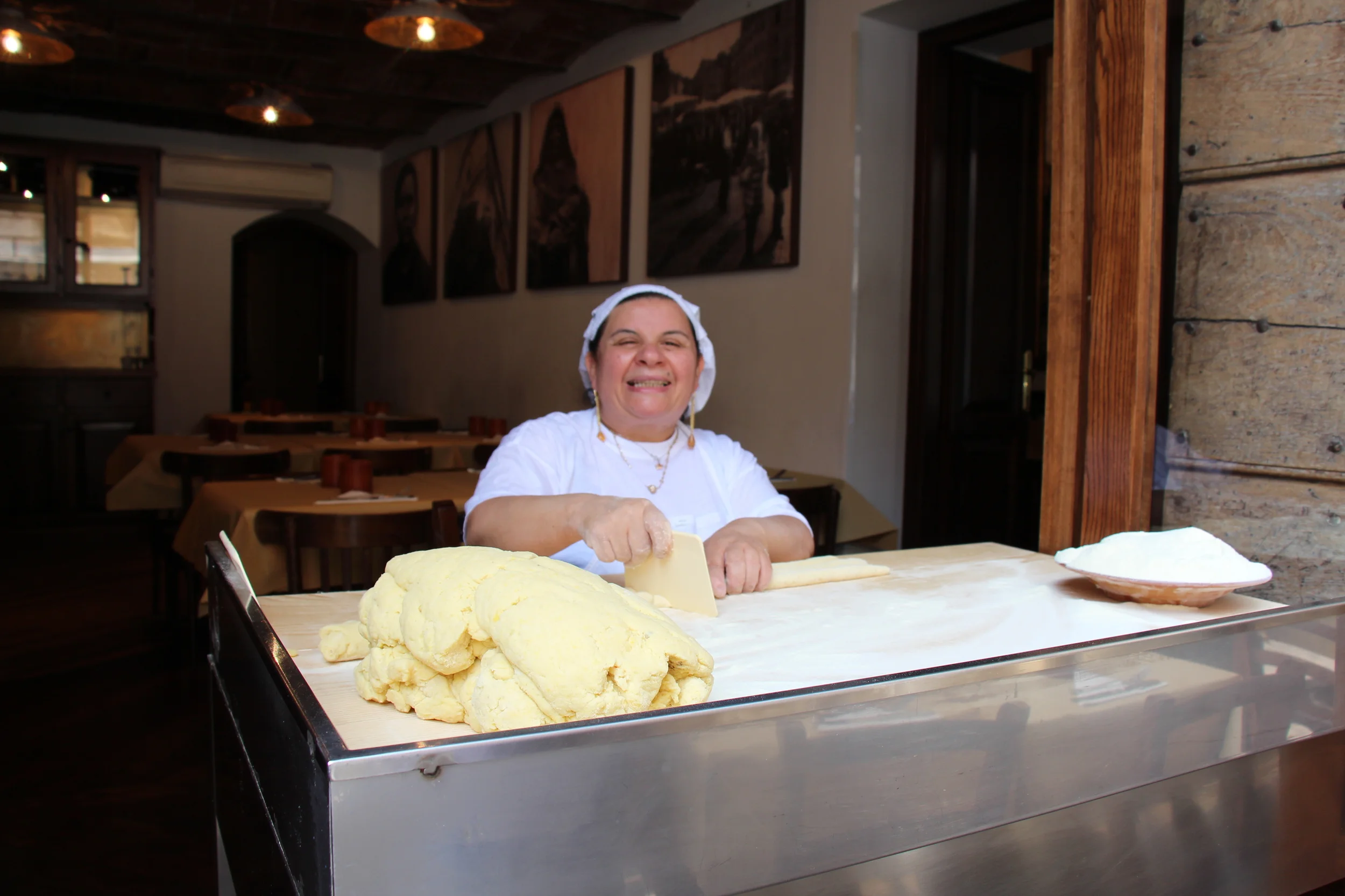 Rolling and cutting gnocchi, Osteria La Fortunata, Rome, Italy